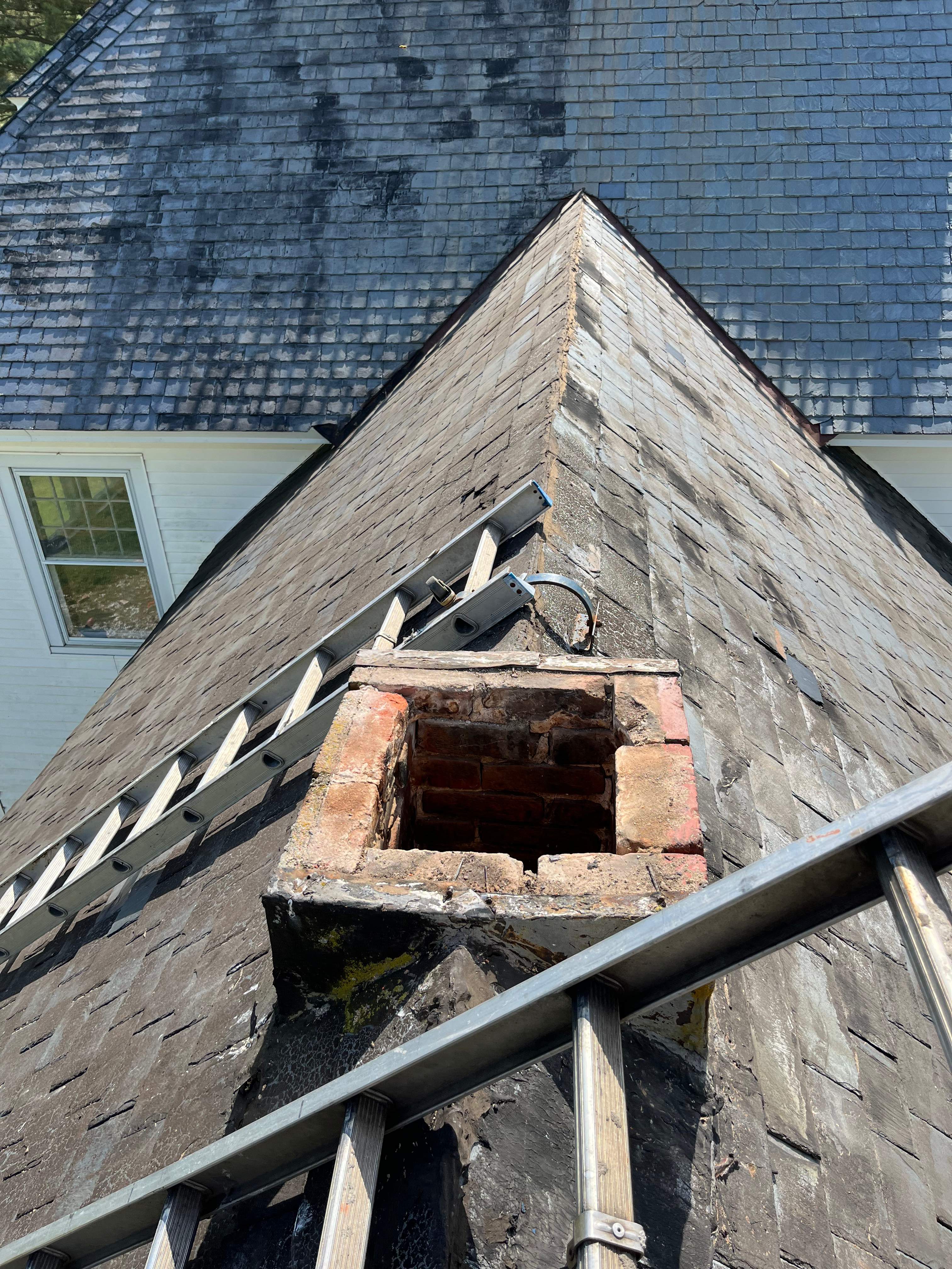 Wood Stove Installation and Fireplace Build by Premier Chimney and Roofing