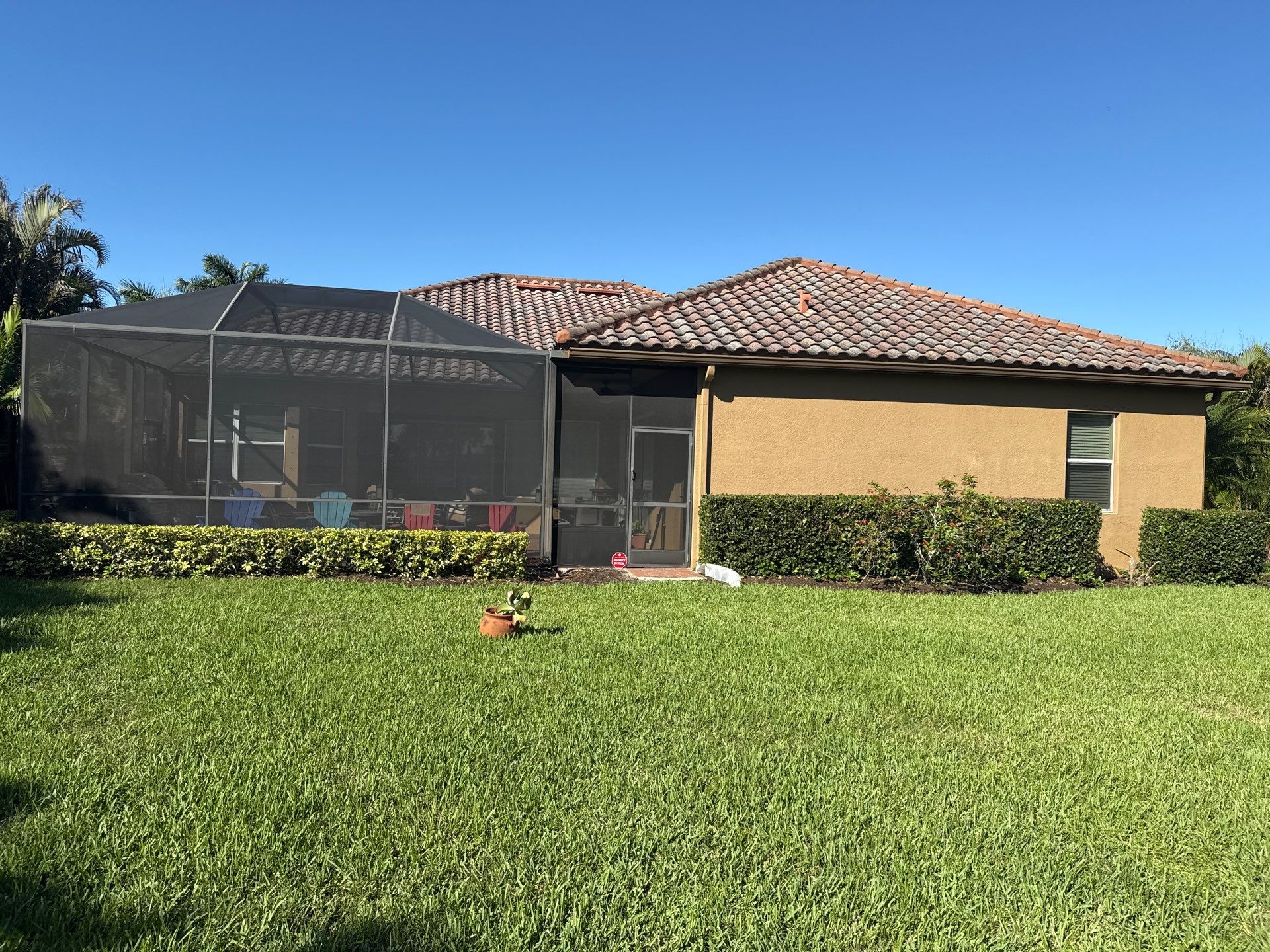 This project focused on a full gutter clean-out to restore proper water flow and prevent overflow issues.  Our scope of work included: 	•	Removing heavy leaf and pollen buildup from the gutter system 	•	Clearing out clogged sections along the rear gutters near the pool cage, where debris tends to accumulate more heavily 	•	Inspecting and cleaning the front gutter guards, which had several blocked areas restricting water flow 	•	Ensuring all downspouts and channels were flowing properly after service  Even with gutter guards installed, debris like pollen, shingle grit, and fine organic matter can still build up over time—especially in Florida’s environment. Regular maintenance helps prevent water damage, overflow, and staining on exterior surfaces.  Another thorough job completed by Sunshine AquaWash® – keeping homes protected from top to bottom. by Sunshine AquaWash