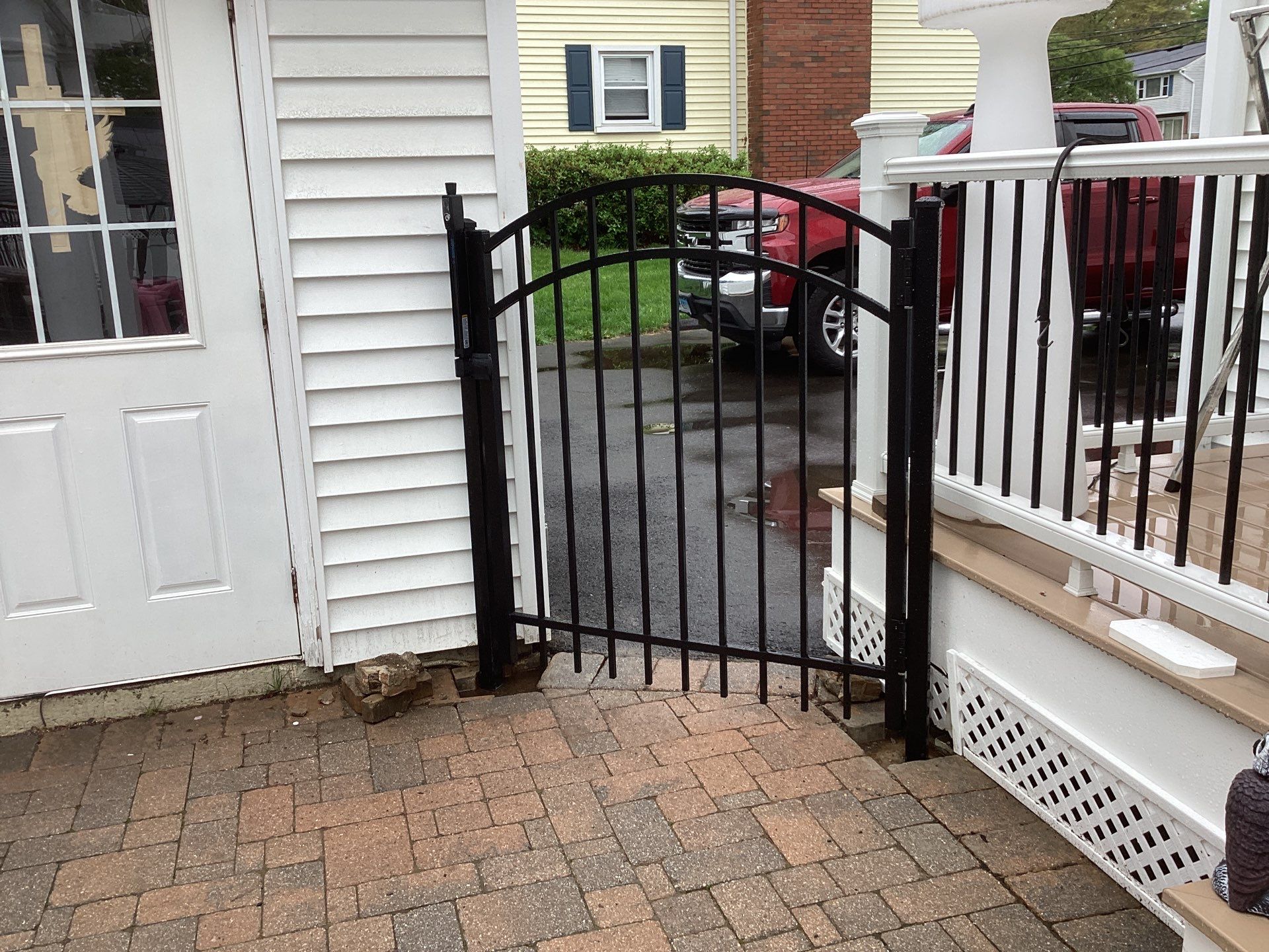 New Black Aluminum Fence and matching Gates by DiGiorgi Roofing and Siding Inc