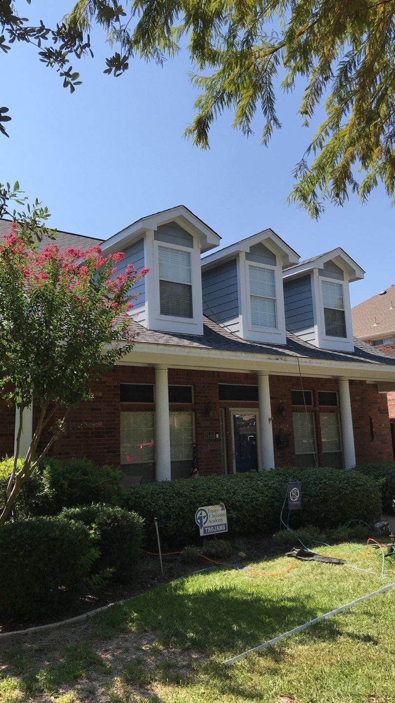 Roof and Gutter Replacement by Rainy Day Restoration