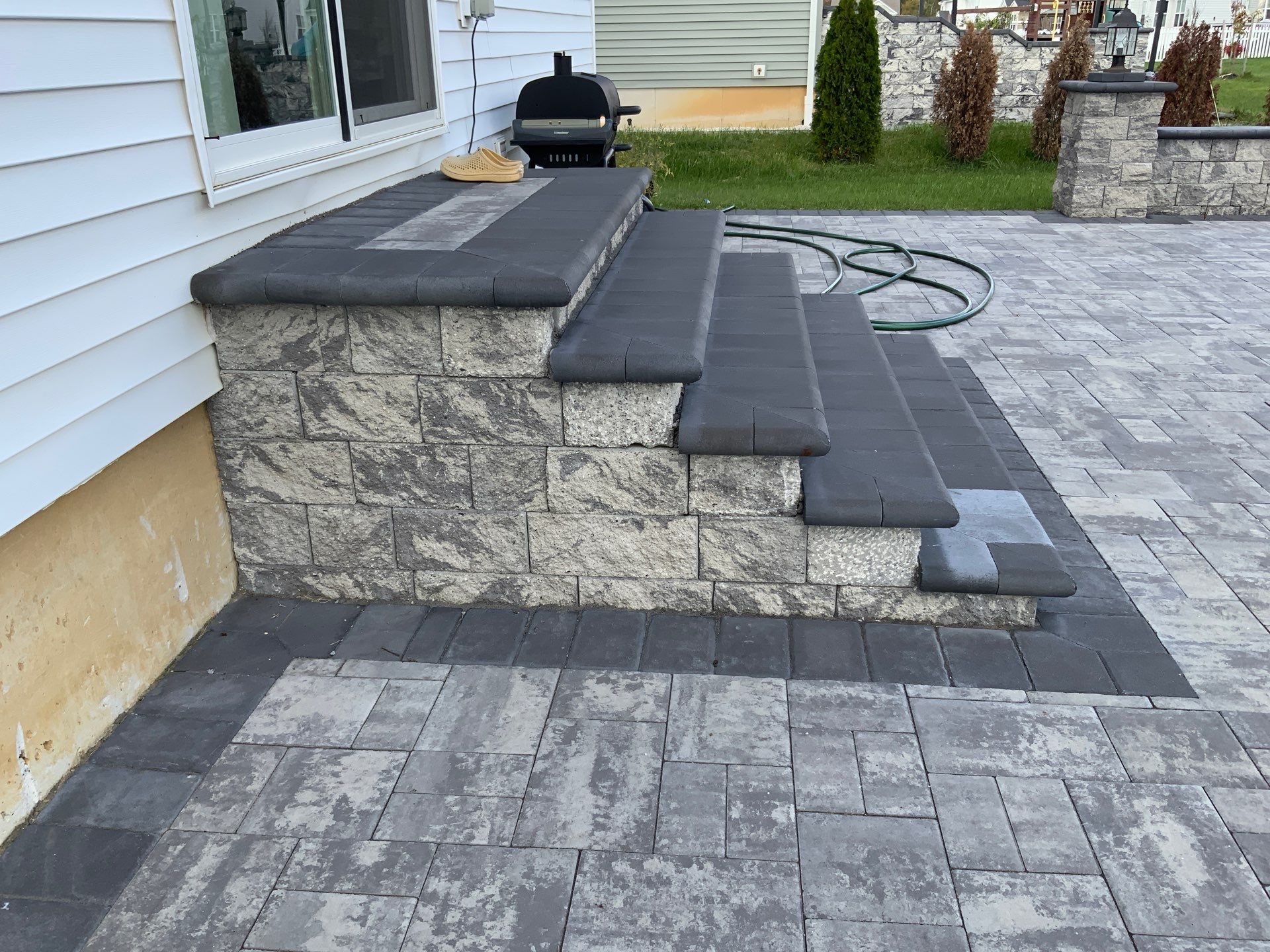 Custom Belgard Paver Patio Design & Installation in Delaware by Studio G Indoor Spaces & Outdoor Living