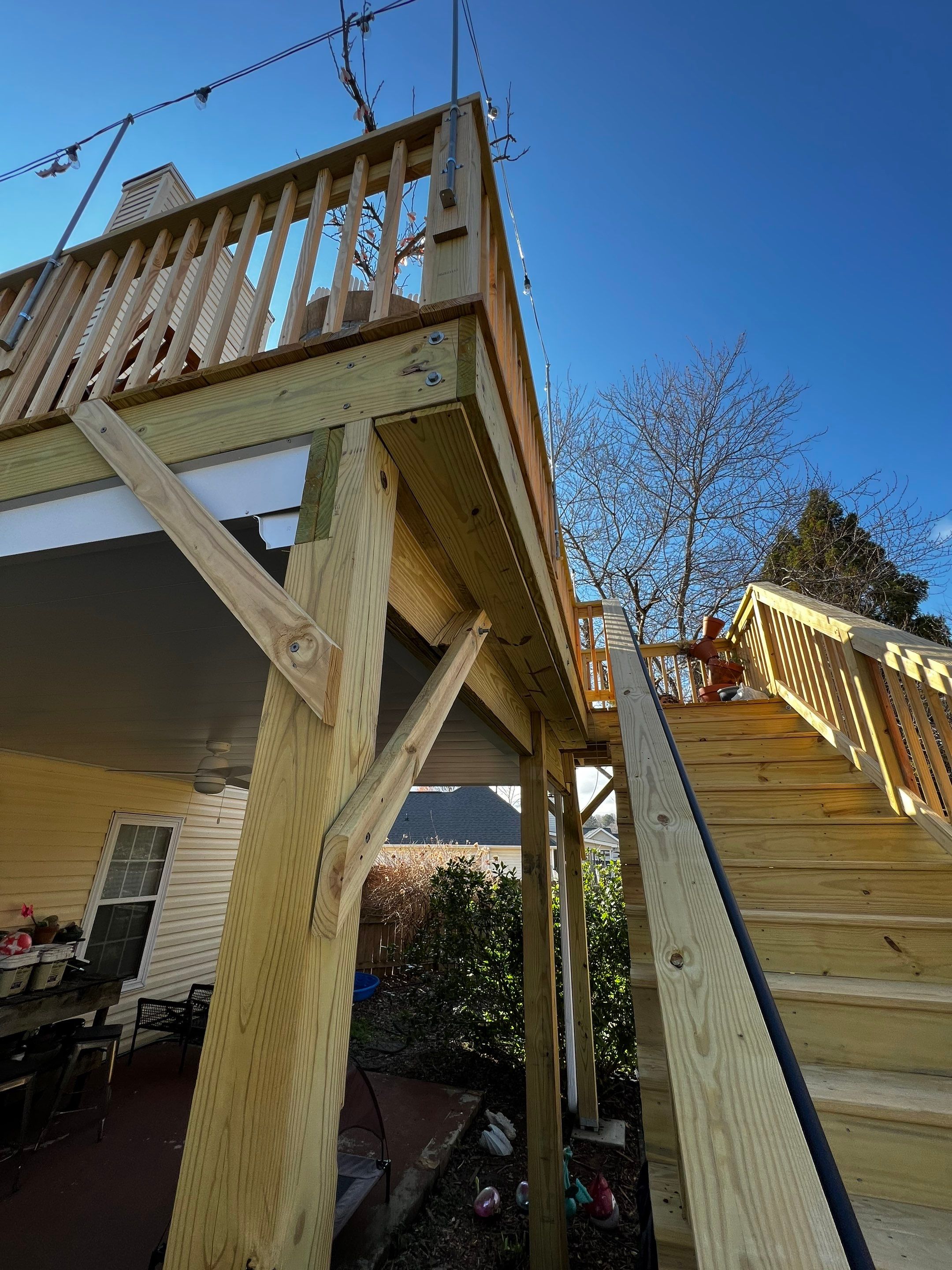 Elevated Wooden Deck Replacement and Under-Deck Ceiling in Cartersville by Swift Home Renovations