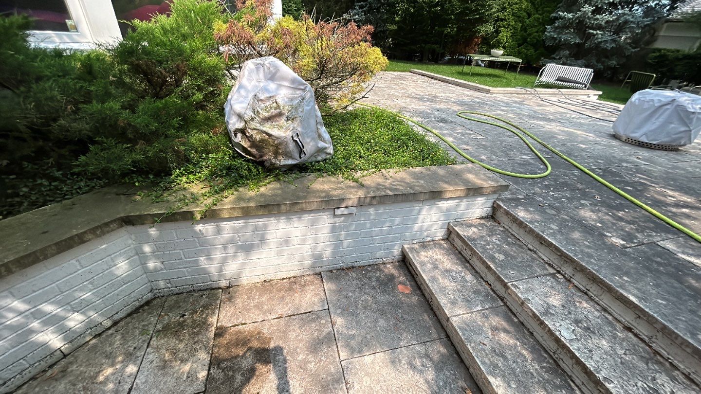 marble patio cleaning and sanding using Polysweep polymeric sand by Northern Power Washing LLC.
