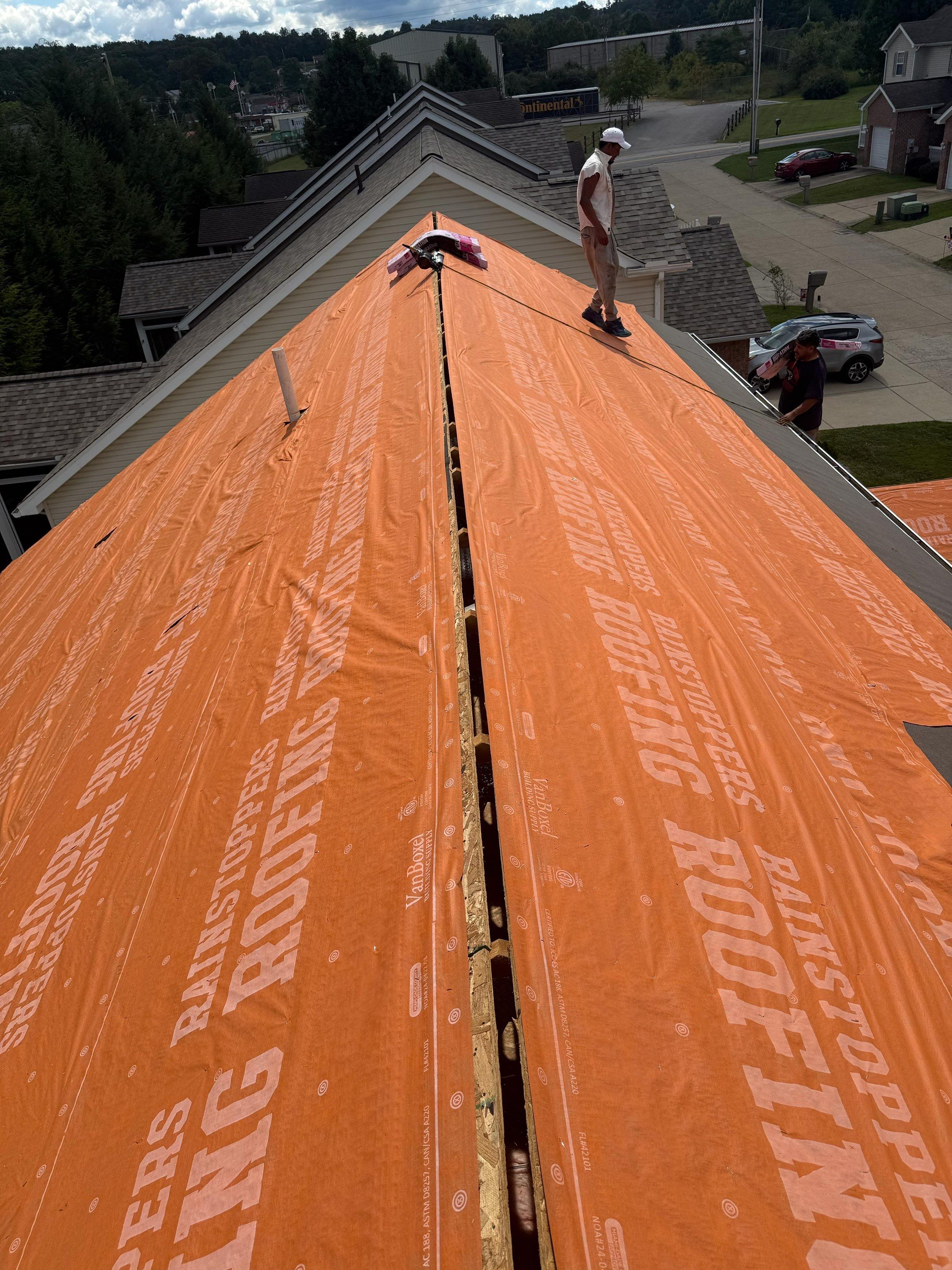 Residential Roofing Installation using Driftwood by Rainstoppers Roofing