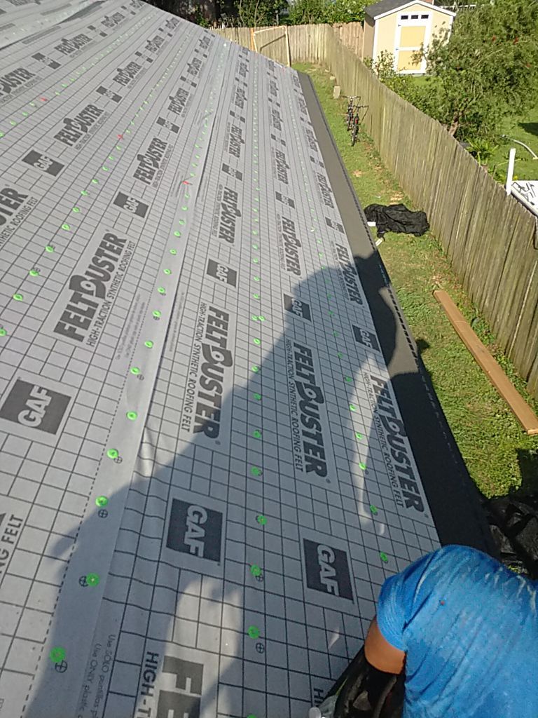 Residential Roofing Installation using Roof Replacement by American Roofing & Construction LLC
