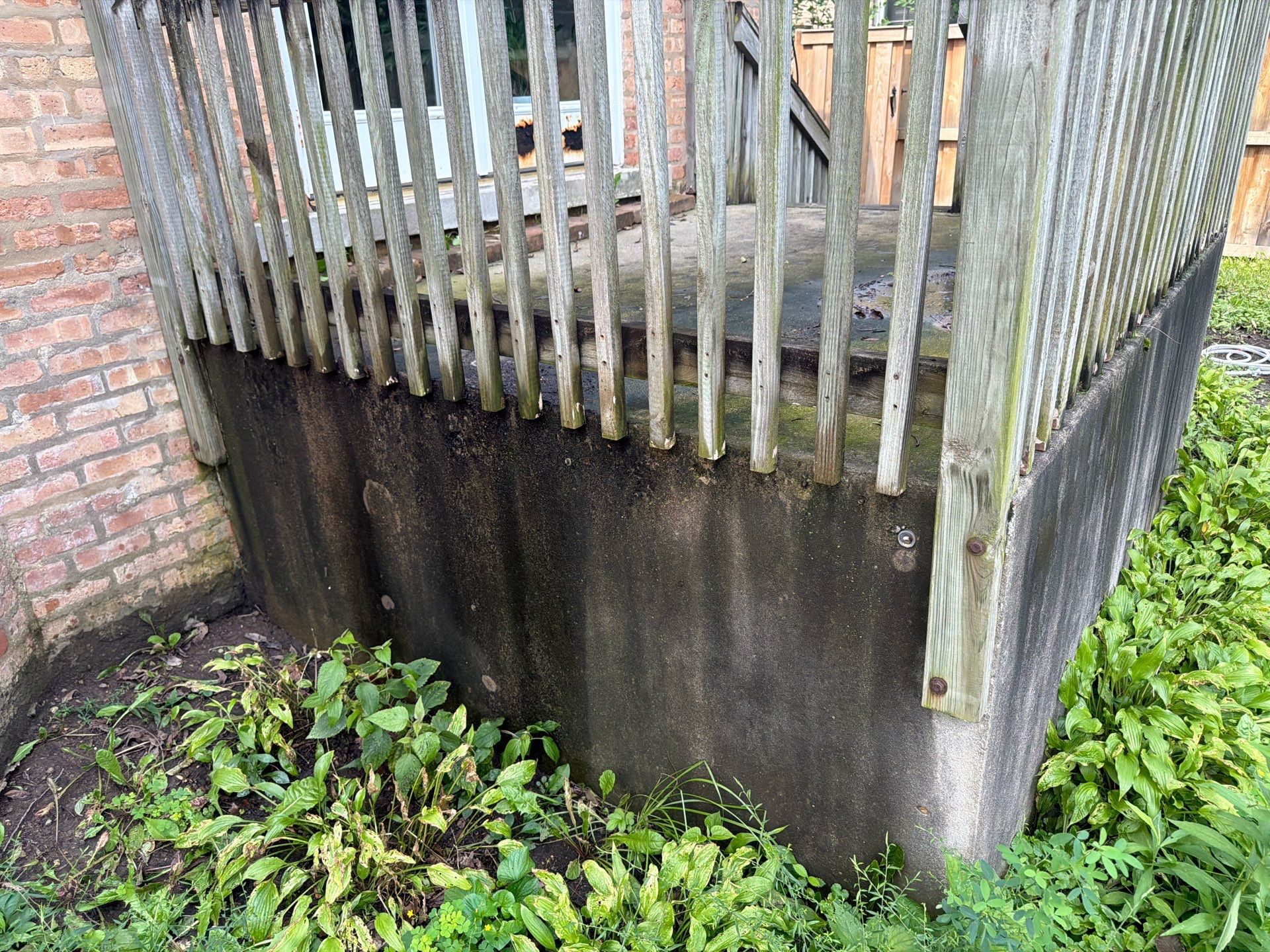 Wood fence cleaning and sealing by Northern Power Washing LLC.