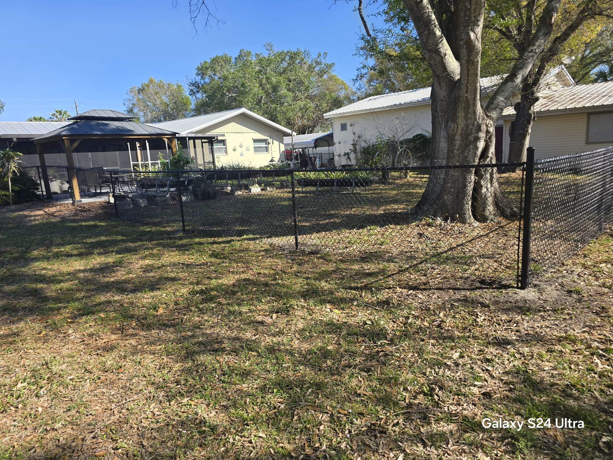 Black Chain Link Fence Installation in Port Charlotte by True Fence LLC