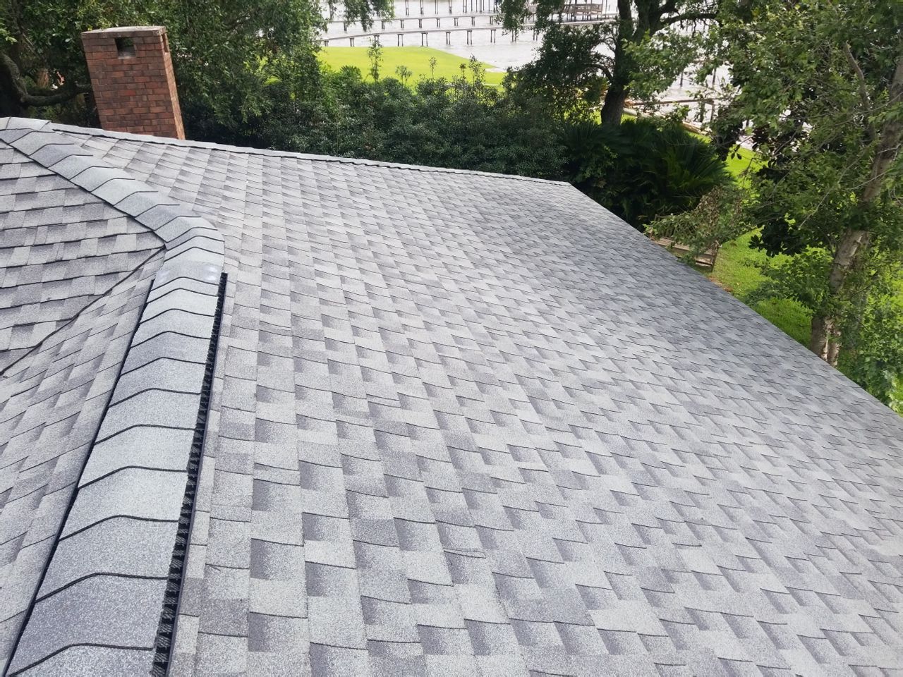 Residential Roofing Installation using Roof Replacement by American Roofing & Construction LLC