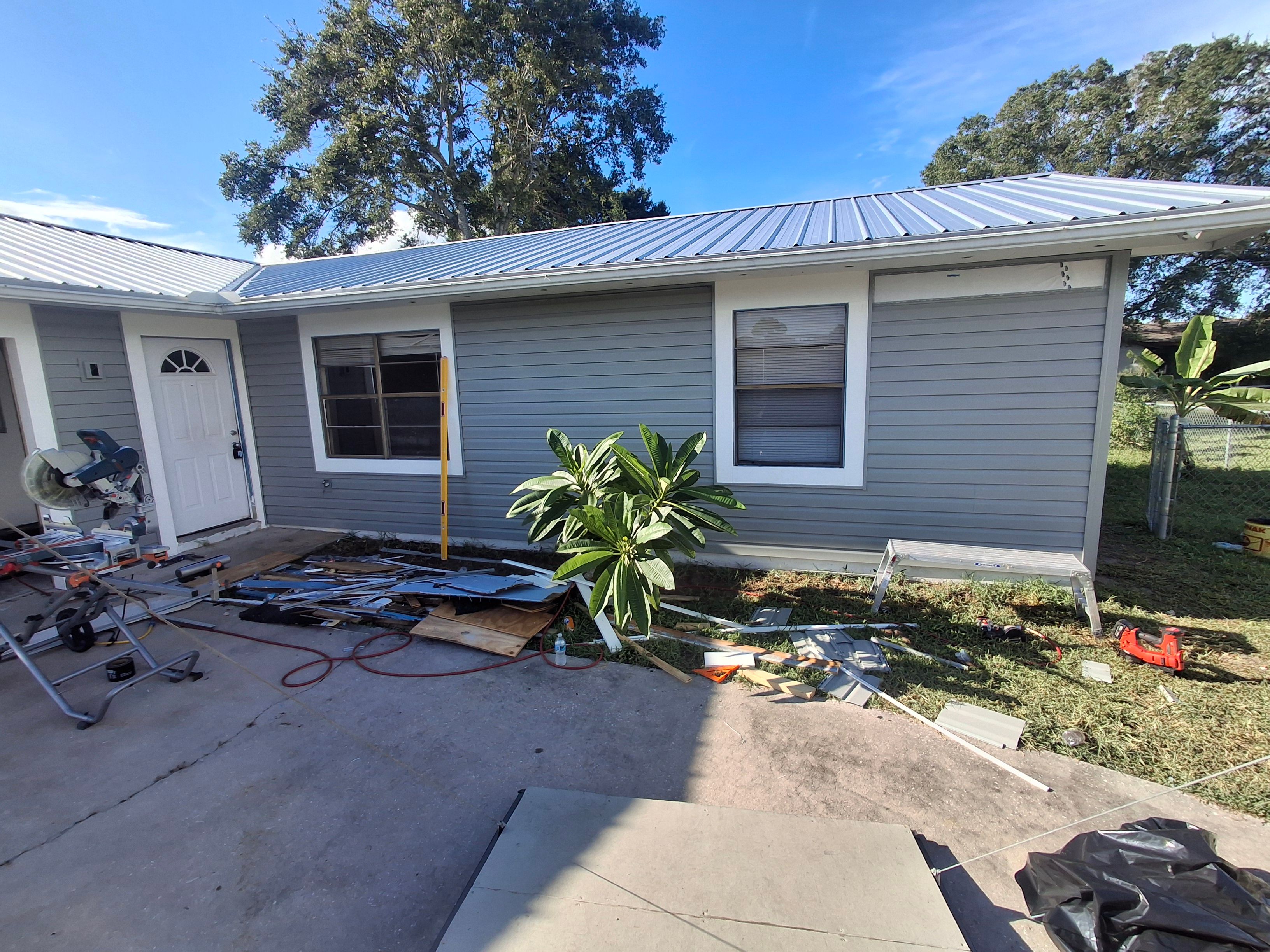 Vinyl Siding Installation and Structural Wood Rot Repair in Palm Bay by Florida Roofing and Renovations Inc.
