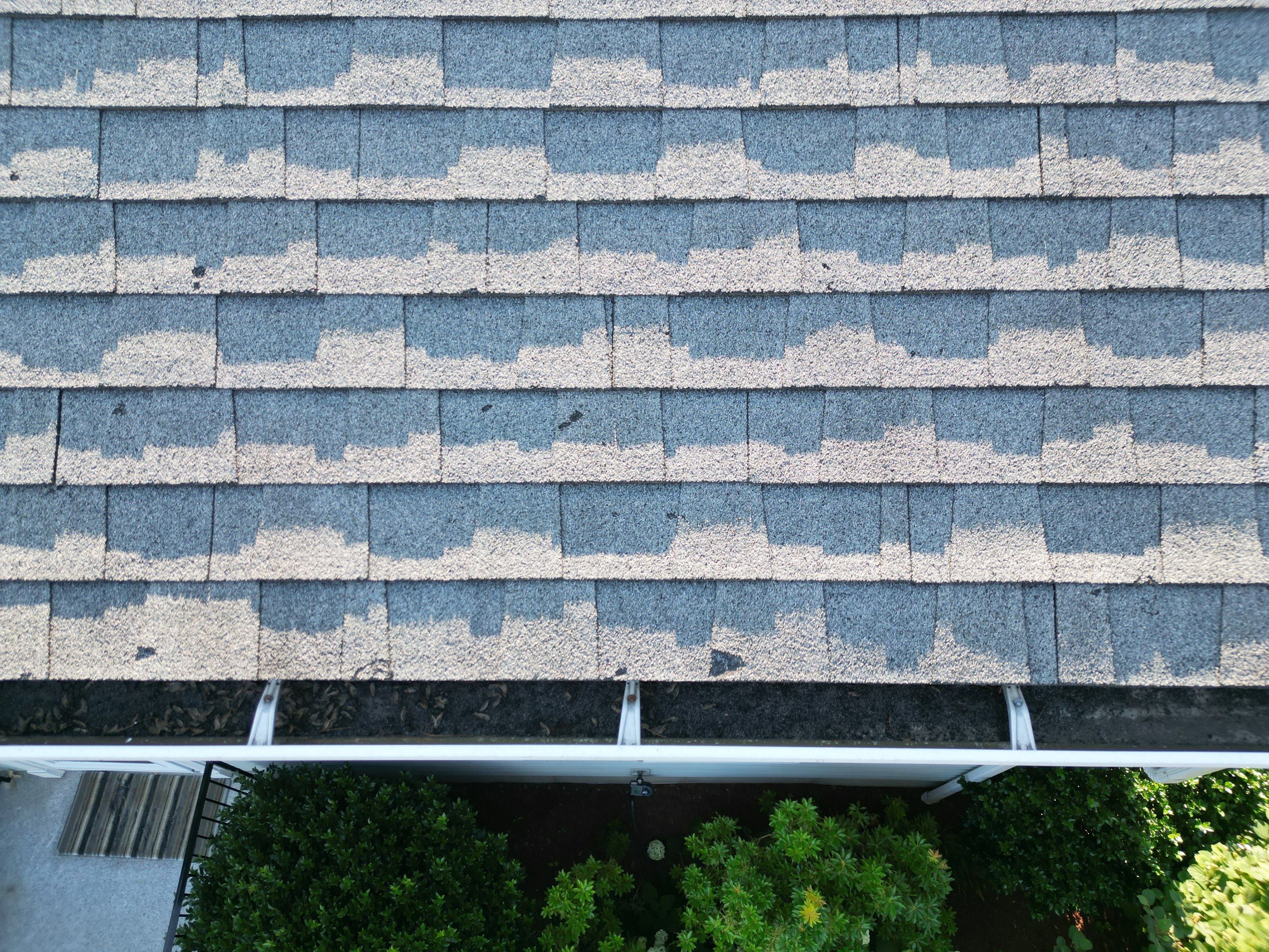 Complete Roof Replacement with Chimney Flashing, Gutter Guard System, and Vinyl Siding Repairs by Mighty Dog Roofing of Greater Middlesex County