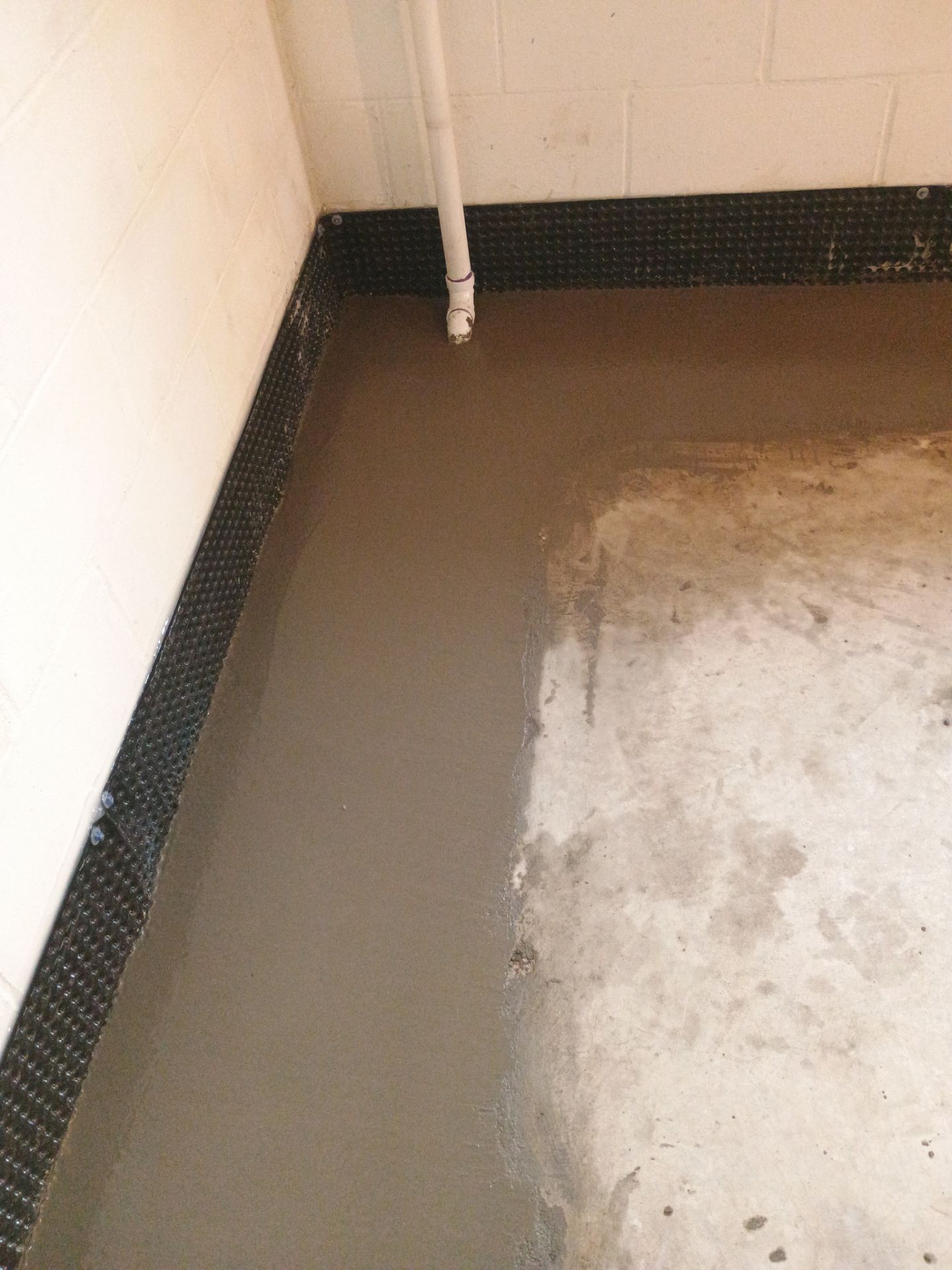 Tying Into an Existing Drain Tile System for Alec by Waterproofing Northeast