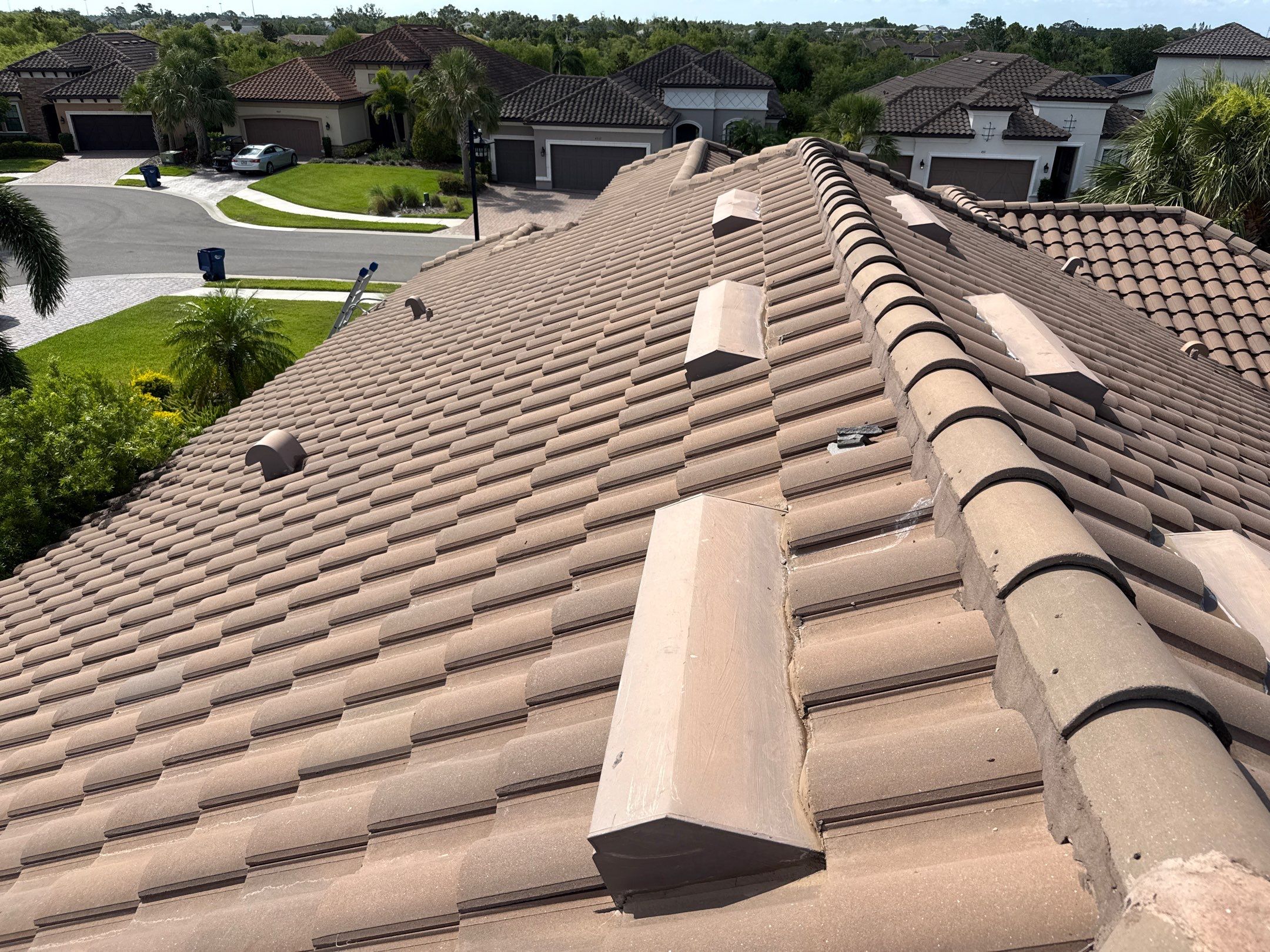 Soft Wash Roof Cleaning – Concrete Tile Roof | Artisan Lakes Esplanade, Palmetto, FL by Sunshine AquaWash