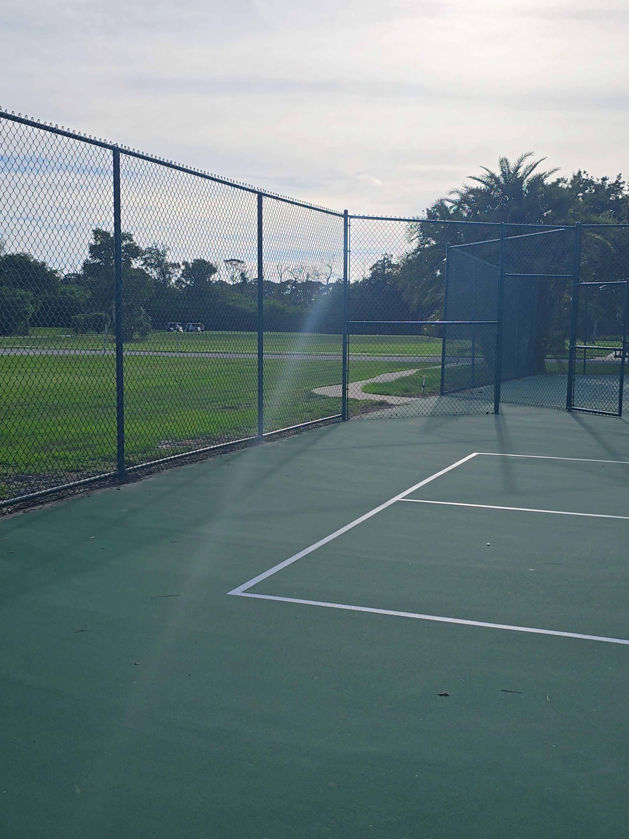 Commercial Tennis Court Chain Link Fence Repair in Sarasota by True Fence LLC