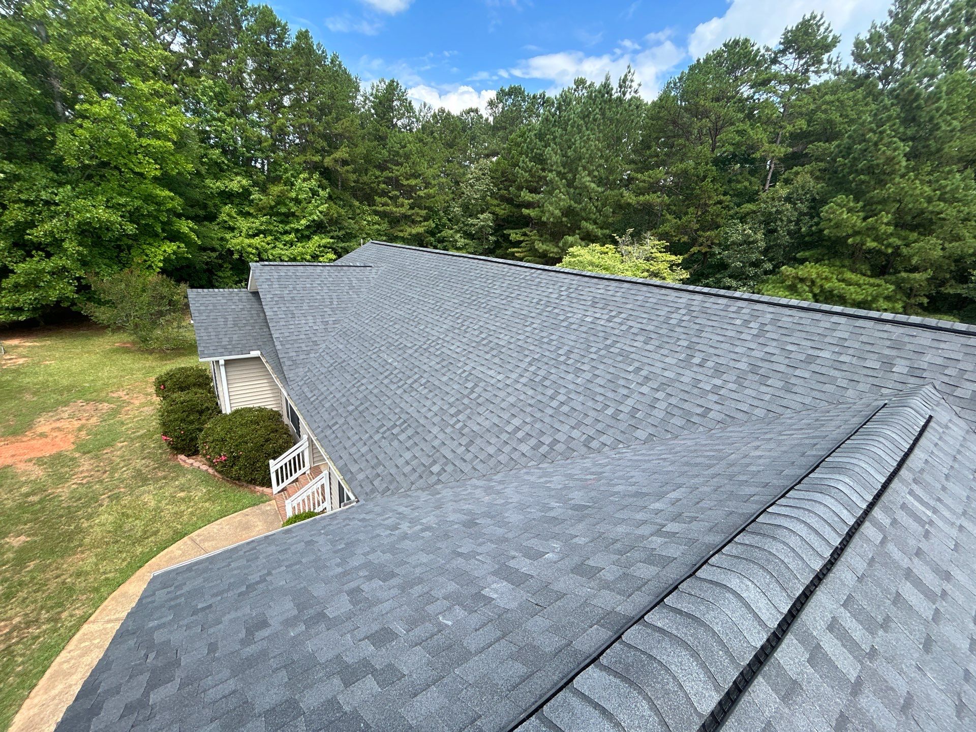 Residential Roofing Installation using CertainTeed Moire Black by Roofsters