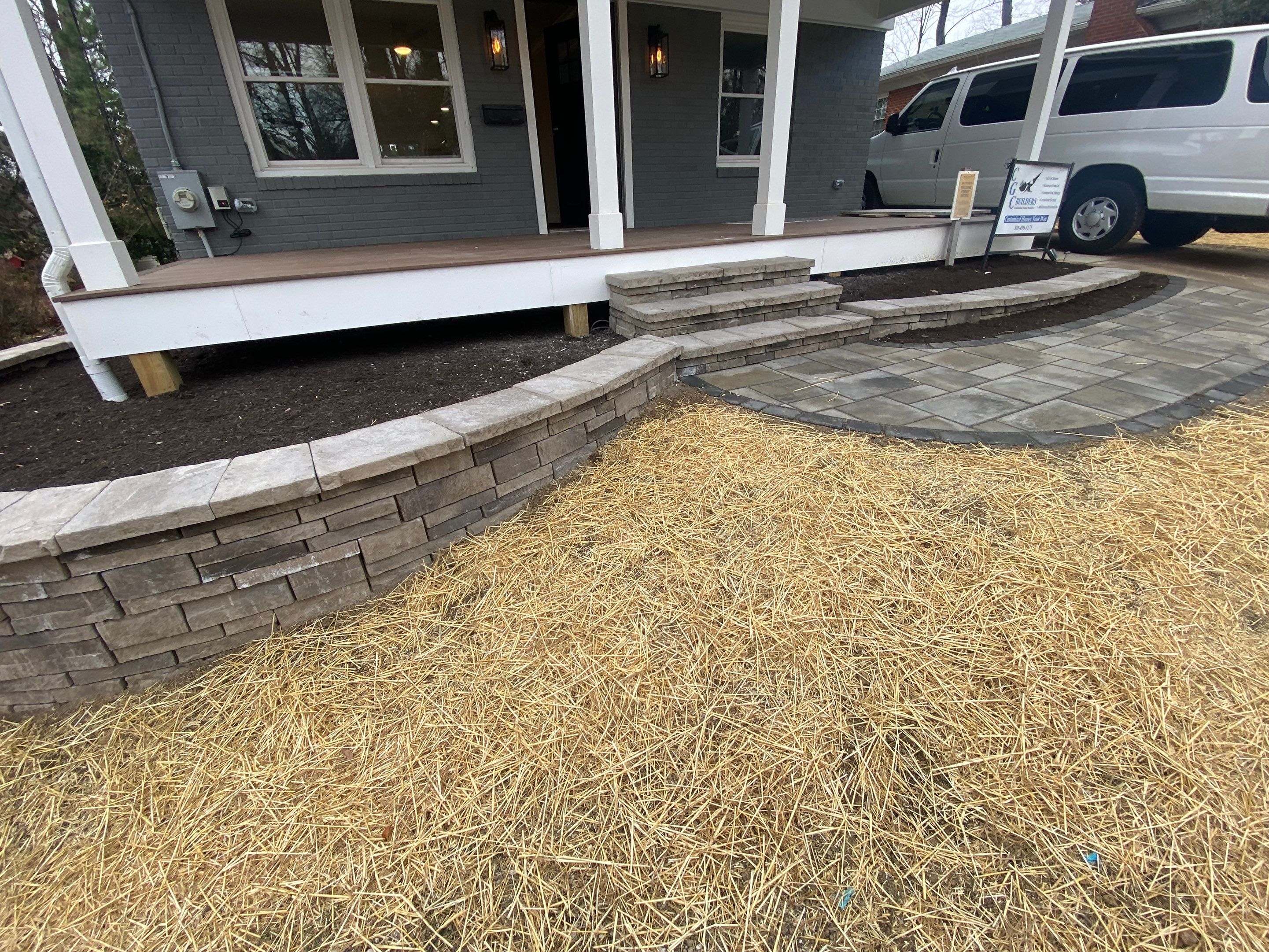 Retaining wall, walkway, small patio and landscape install by The Smet Companies, LLC