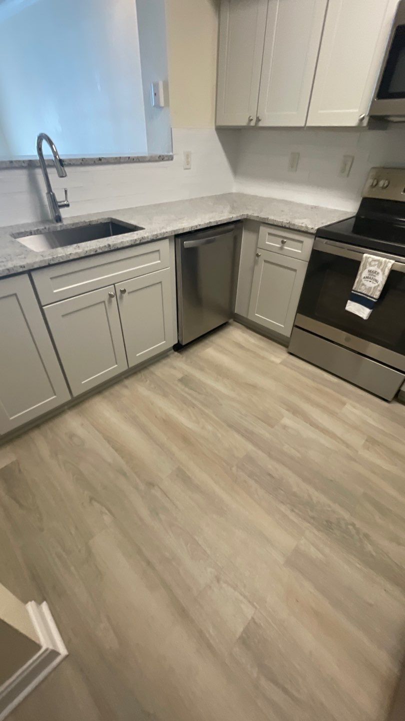 Home Remodel using LVP Flooring and Cabinets by HandyMangum