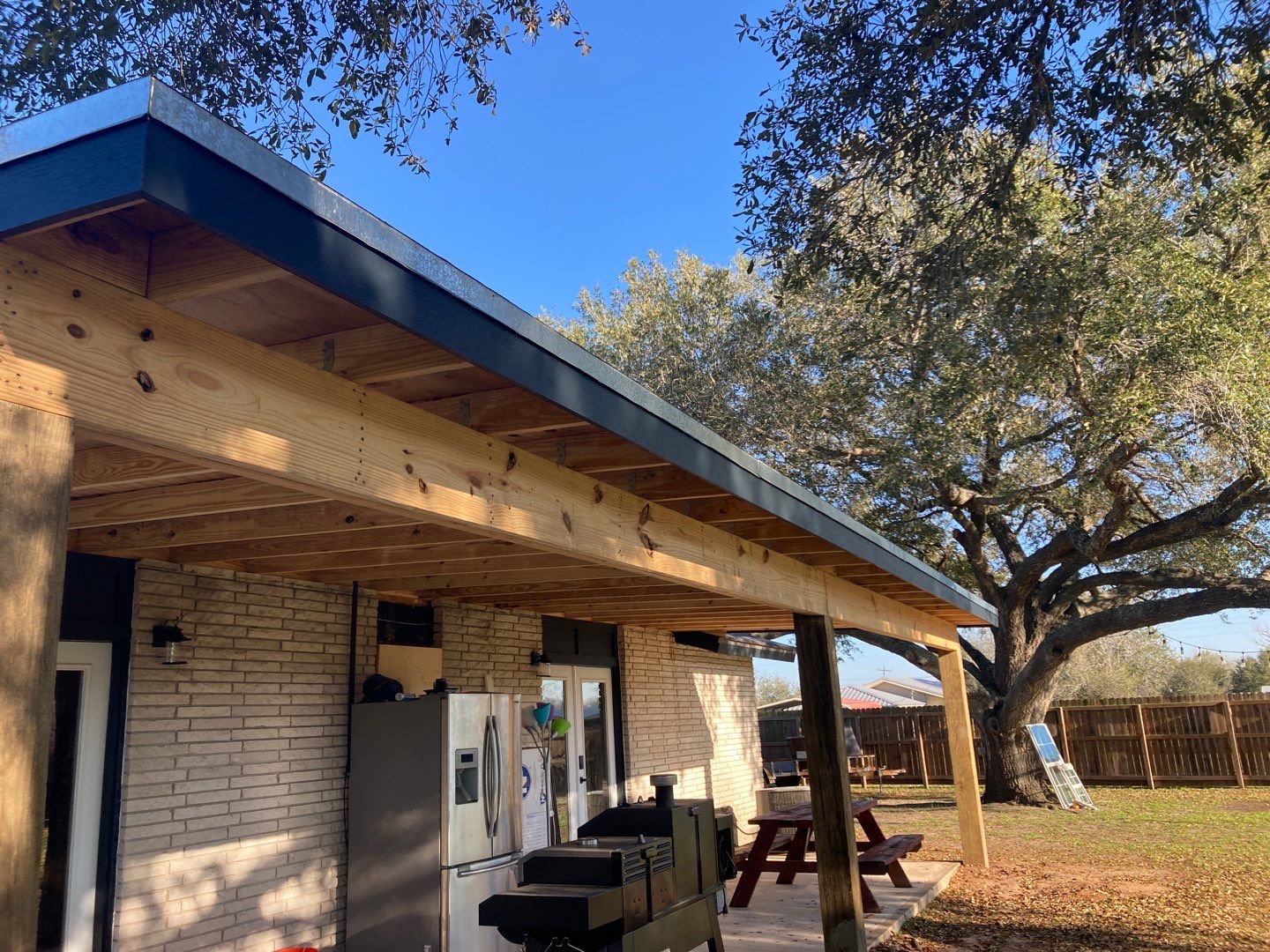 Beeville Backporch sittin' by Bayfront Roofing and Construction
