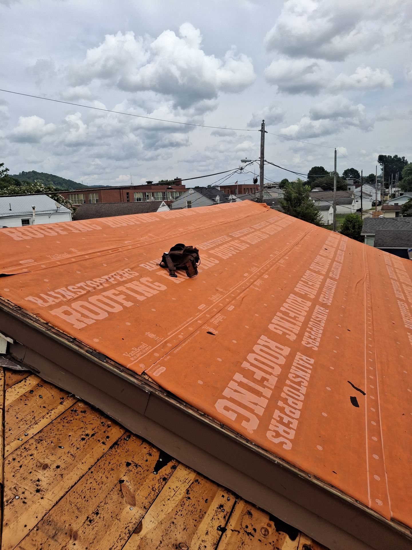 Residential Roofing Installation using Metal by Rainstoppers Roofing