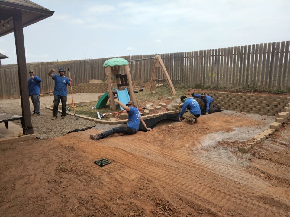 Retaining wall / Playground by Clays Services Inc