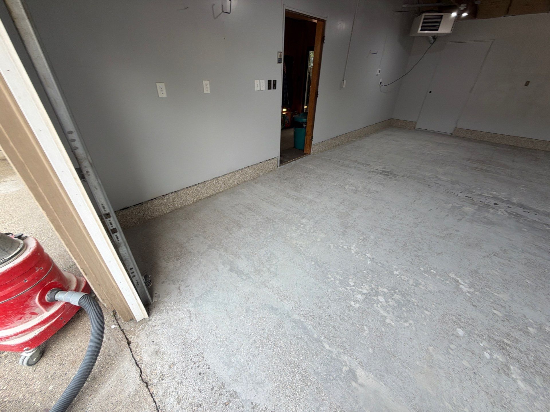 Garage Epoxy Flake Floor Installation and Exterior Siding Repairs in Muskegon by Gordon Painting