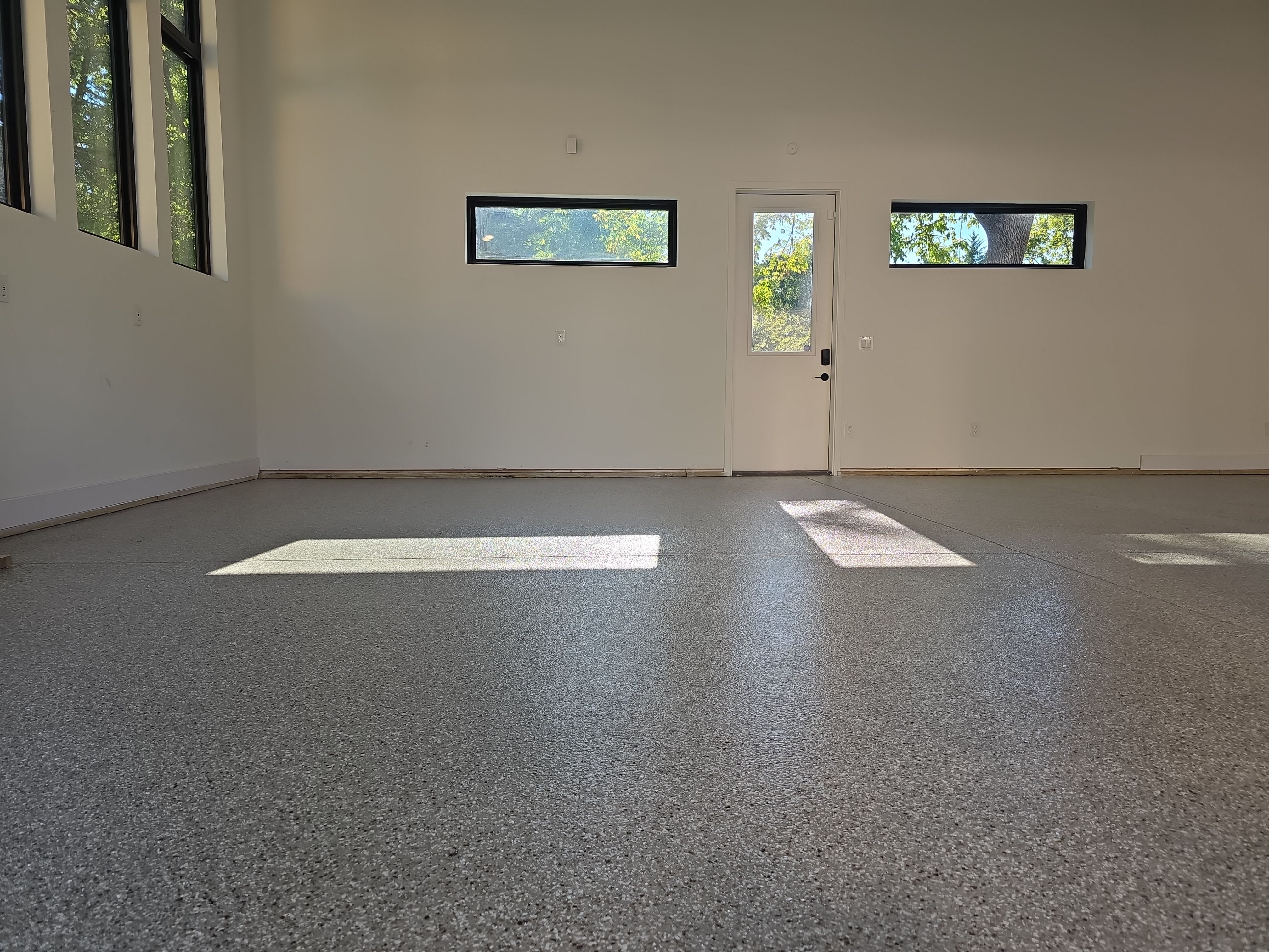 Garage using Creekbed by Elite Floor Solutions