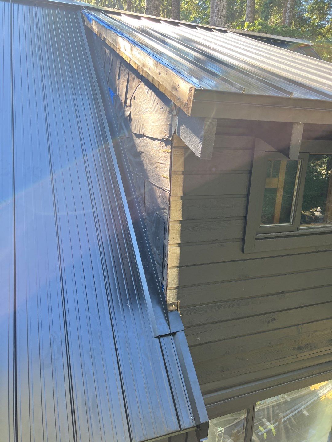 Residential ReRoofing Installation using 12" Prolok metal  by Top Notch Roofing Inc