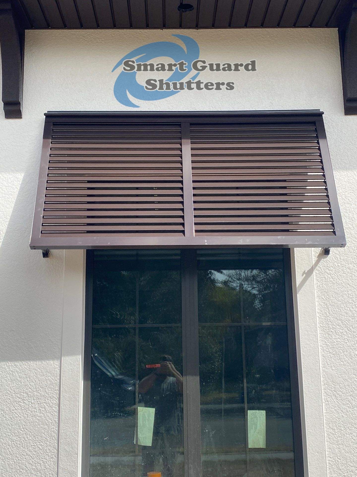 Decorative Bahamas in Grey Brown by Smart Guard Shutters