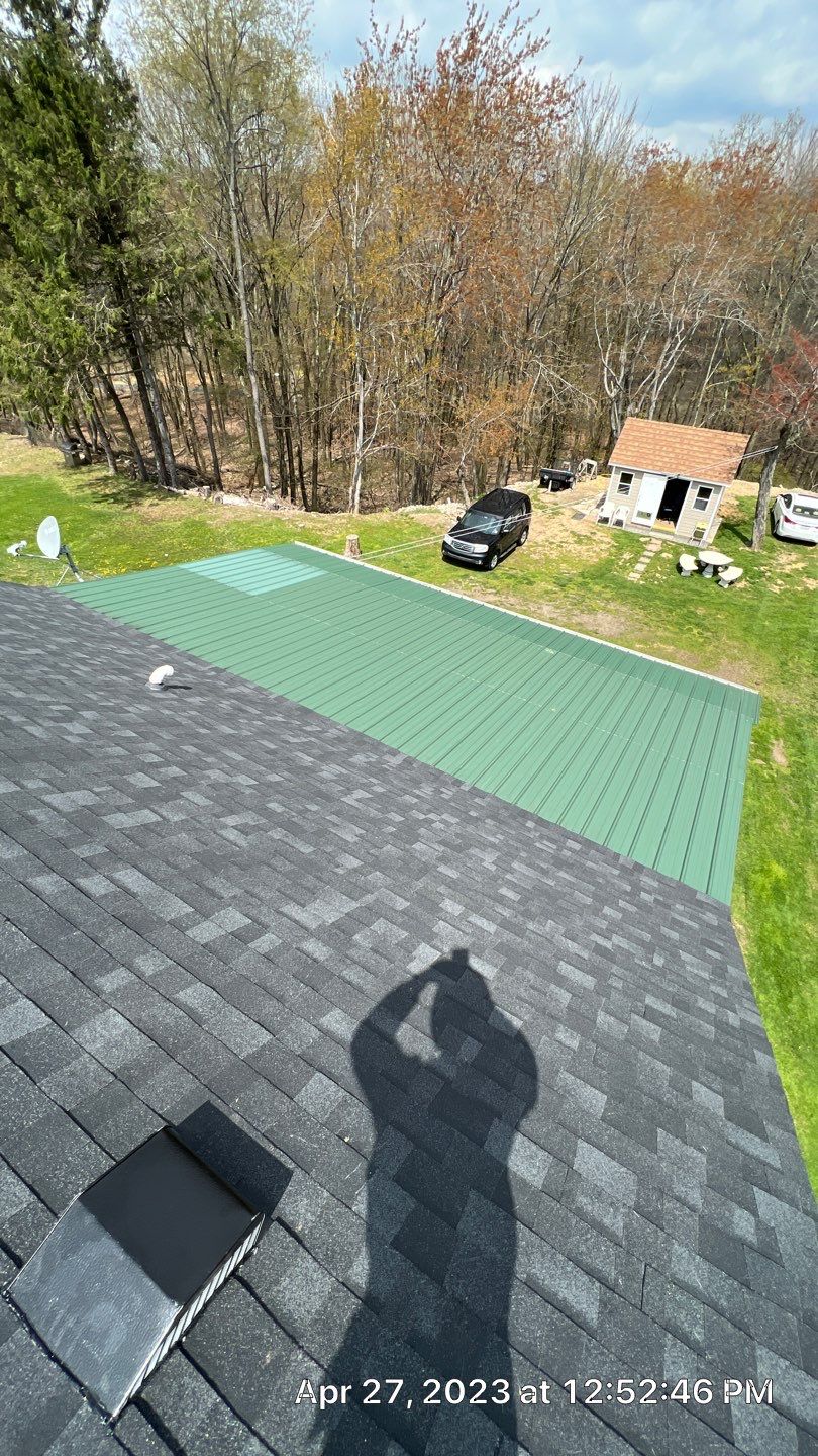Estate Gray Shingles by Reimagine Roofing