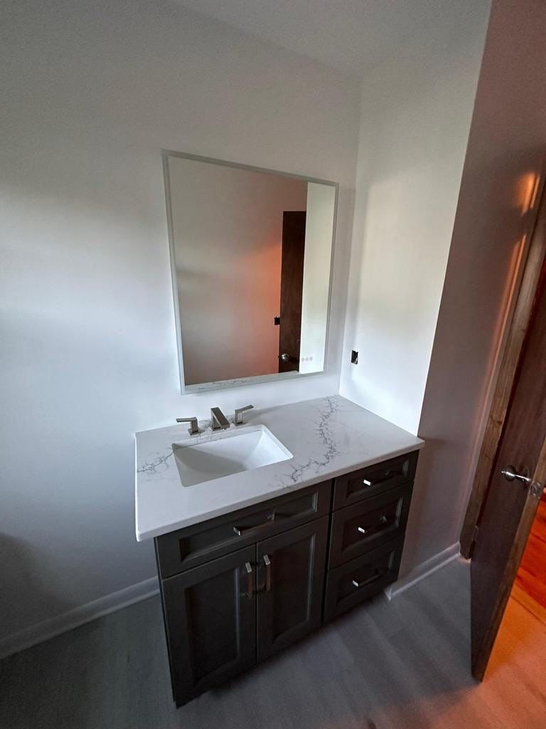 Bathroom Remodel using Tile by Home Concepts Construction