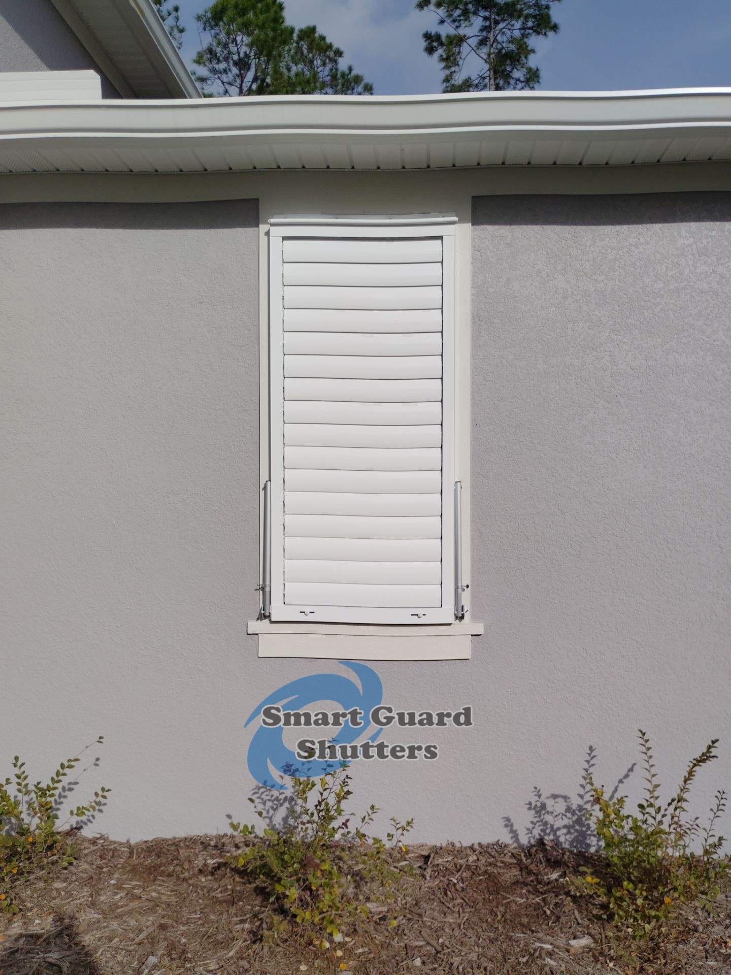 Impact Bahamas in Signal White by Smart Guard Shutters