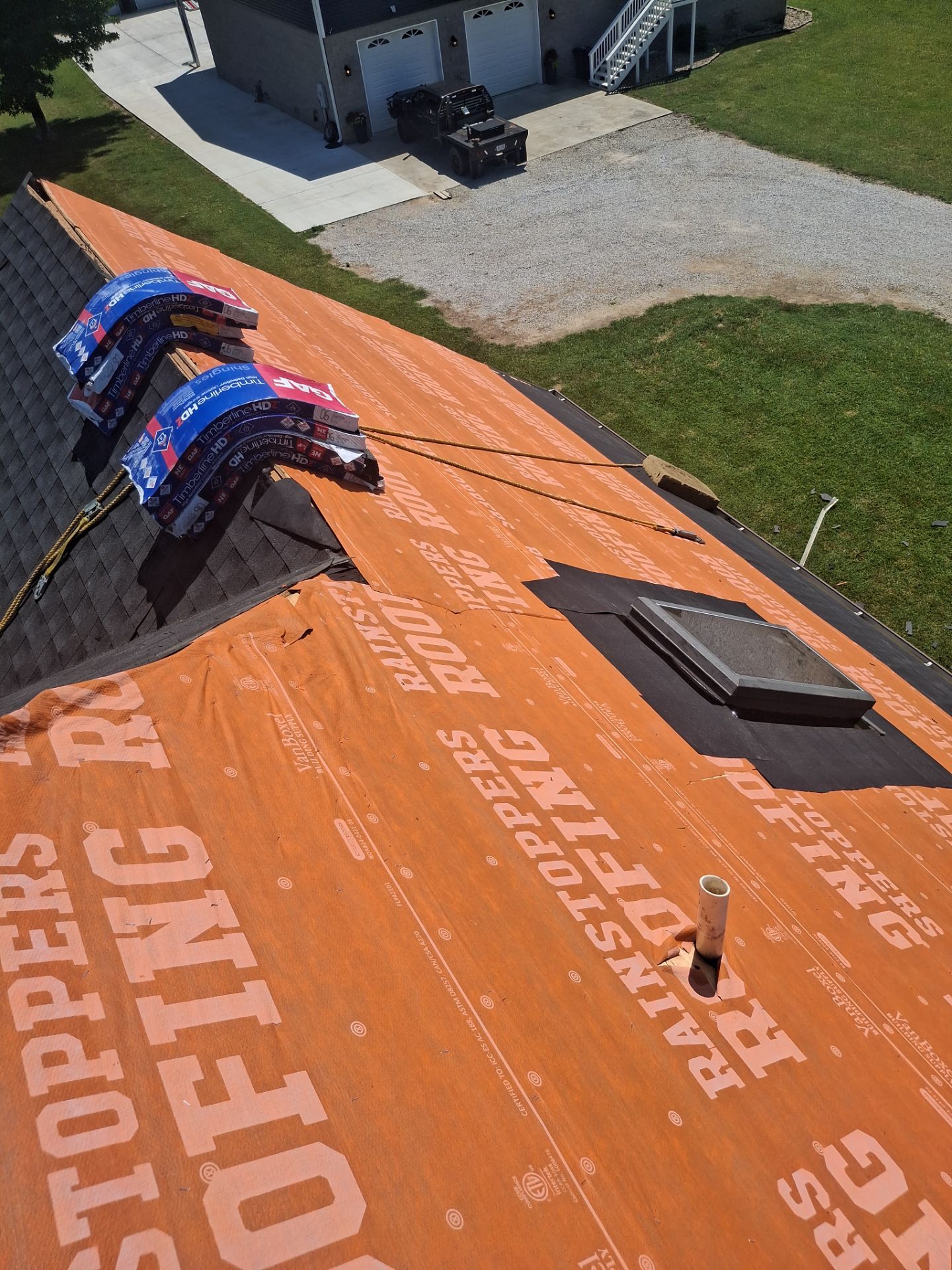 Residential Roofing Installation using GAF Timberline HDZ Charcoal by Rainstoppers Roofing