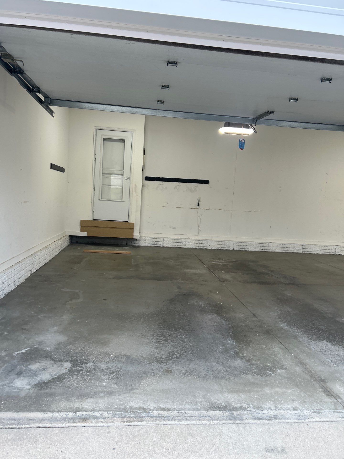 Garage Floor Coating using Domino Flake by Revival Concrete Coatings