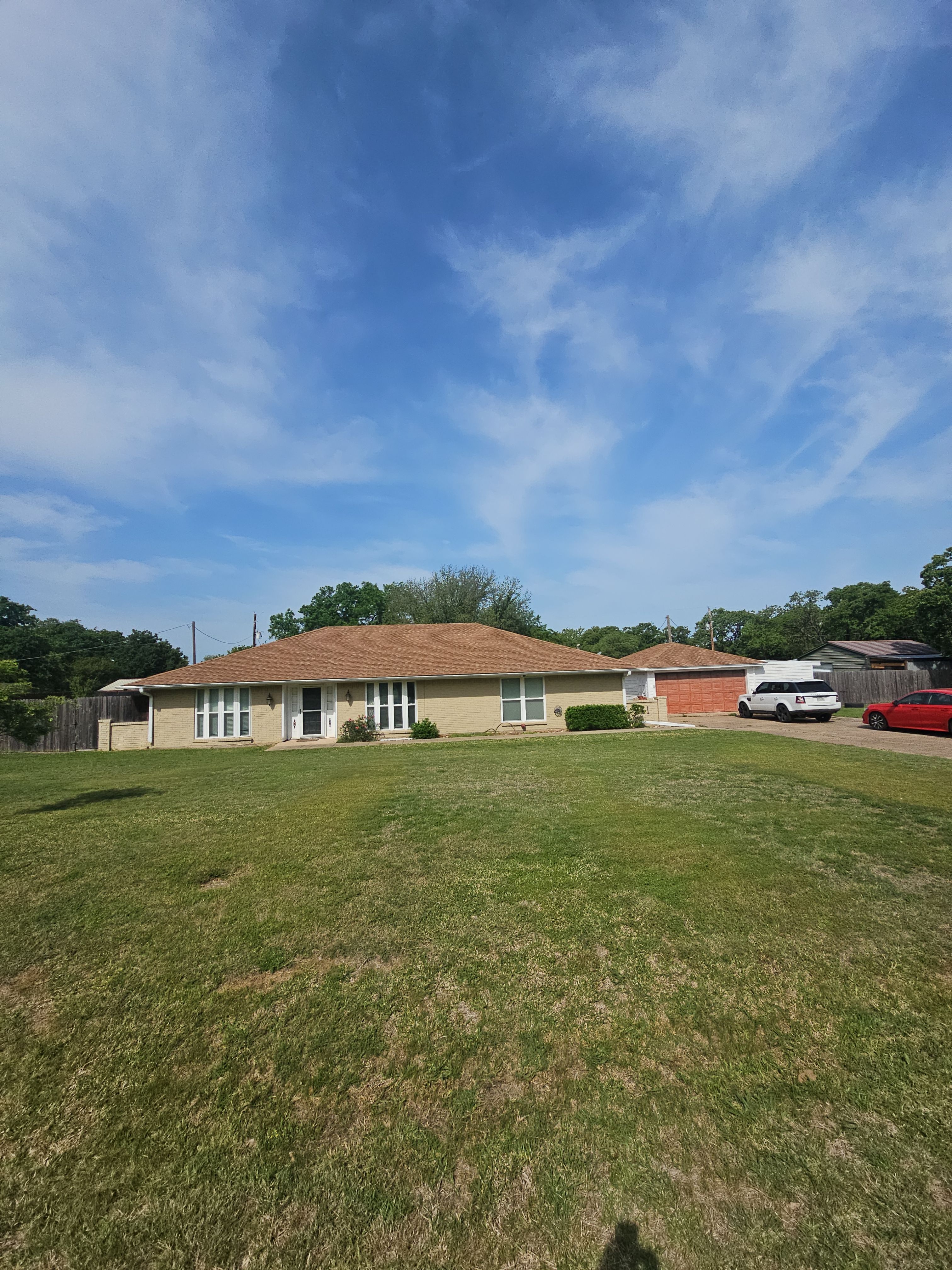 "Full Roof Replacement Due to Hail and Water Damage – Before & After" by road roofing llc