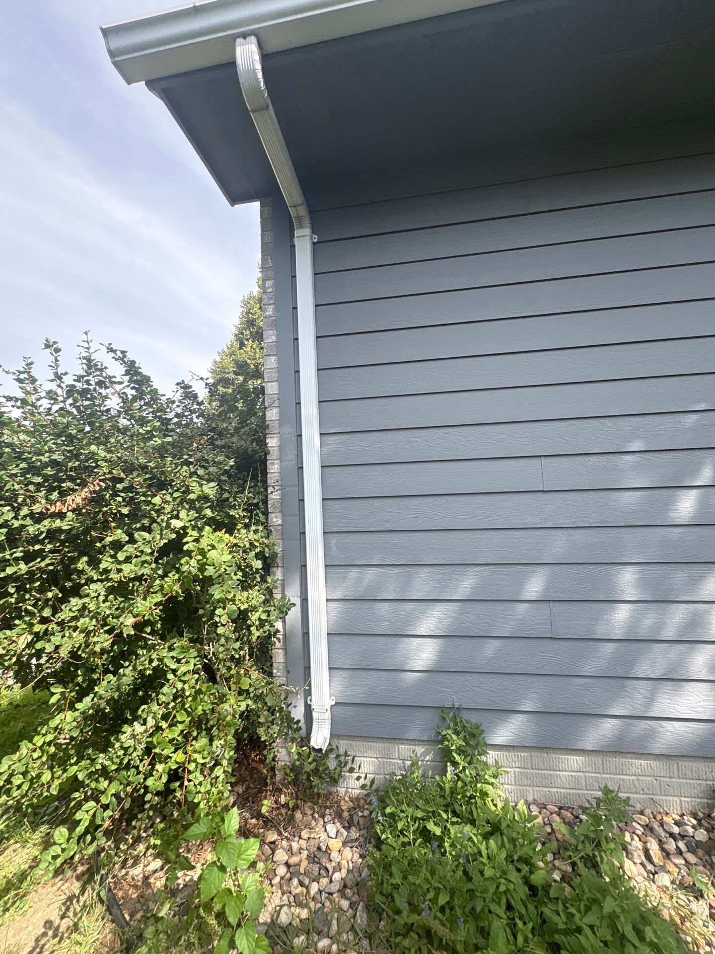 Full Exterior Painting for Gray Siding and Trim in Sioux Falls by Select Painting, Coatings & Garage Cabinets