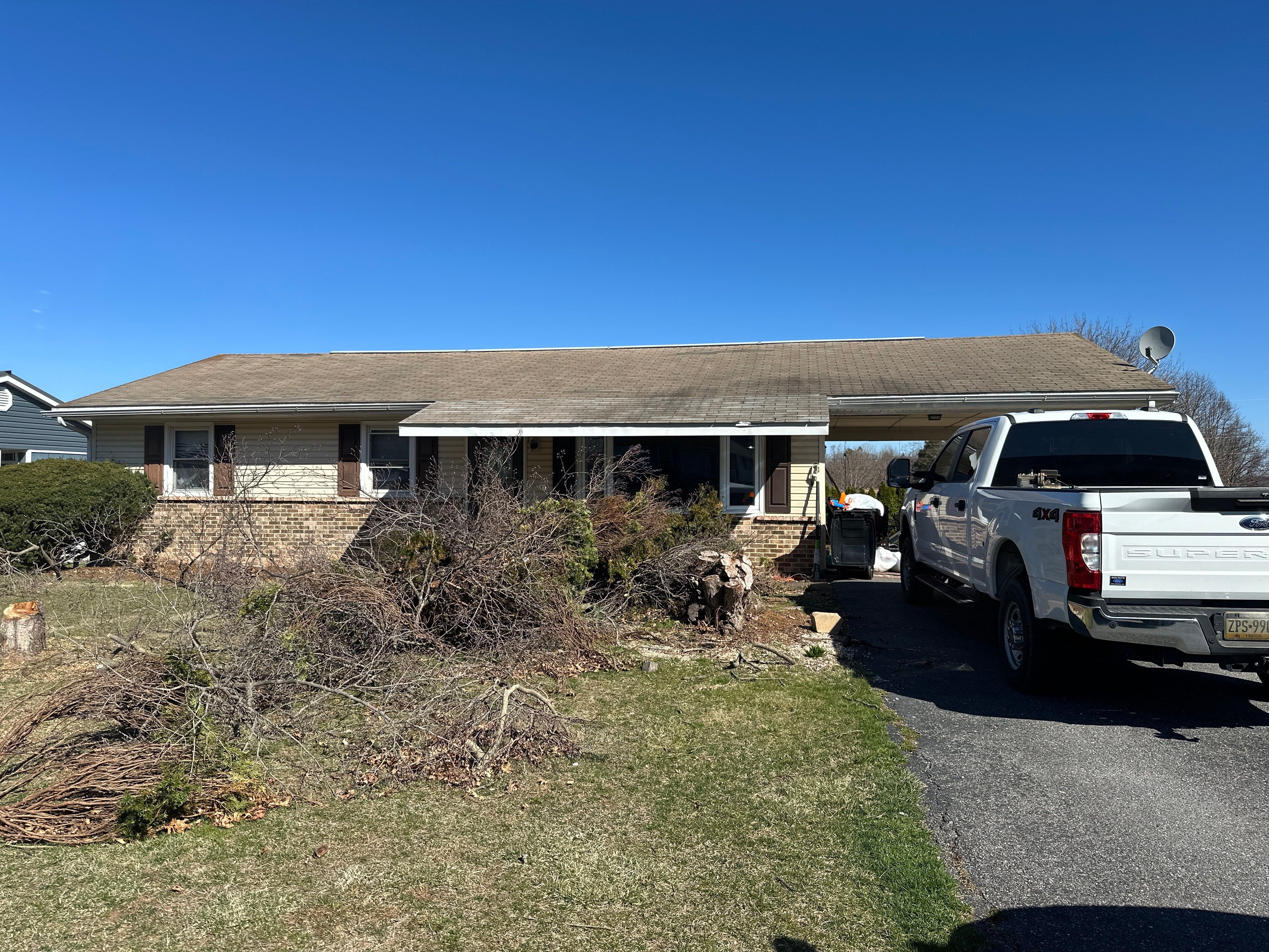 Red ABM Panel Metal Roofing Installation on Elizabethville Ranch Home by Esh Builders