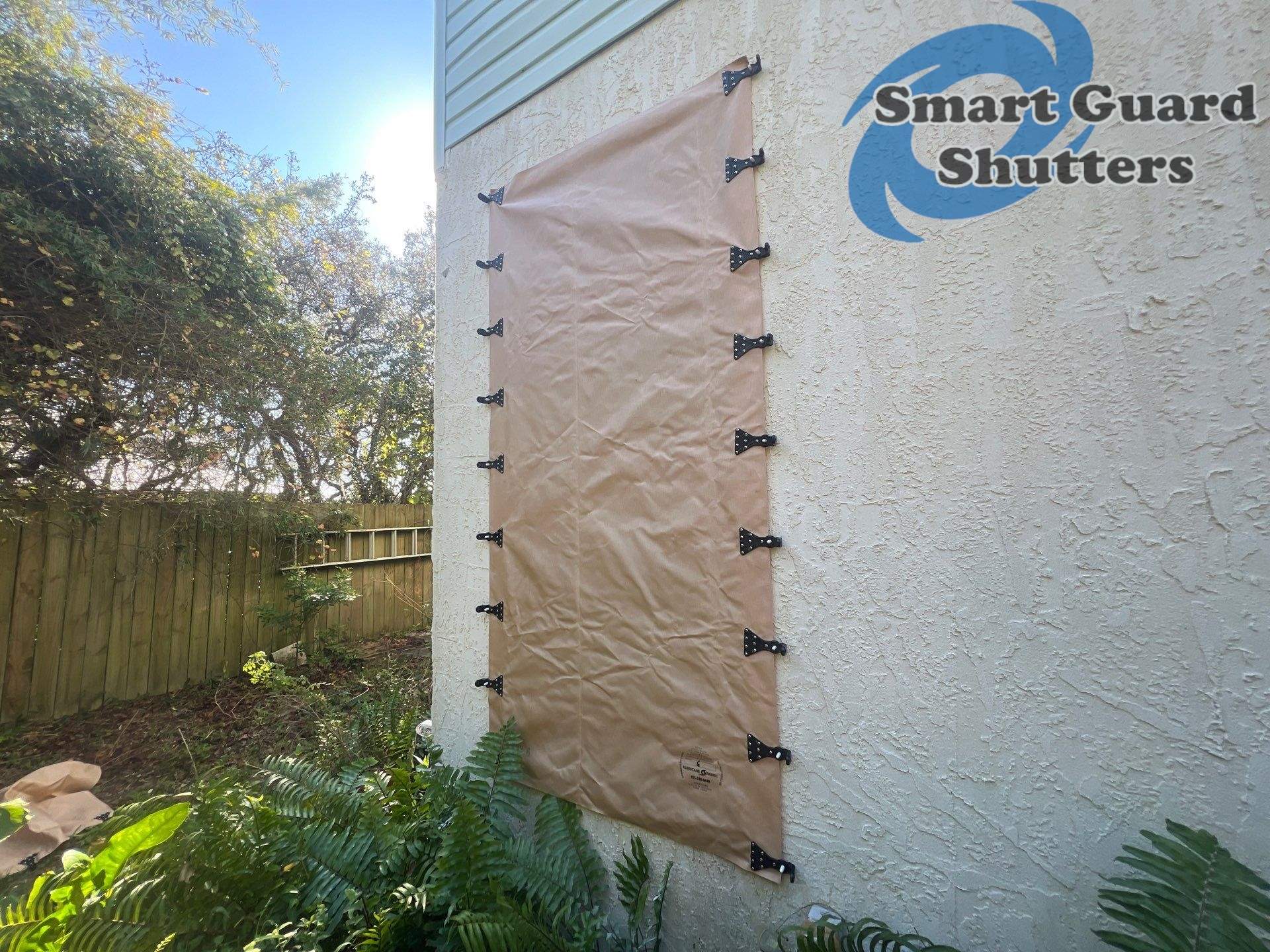 Hurricane Protection in Tan  by Smart Guard Shutters