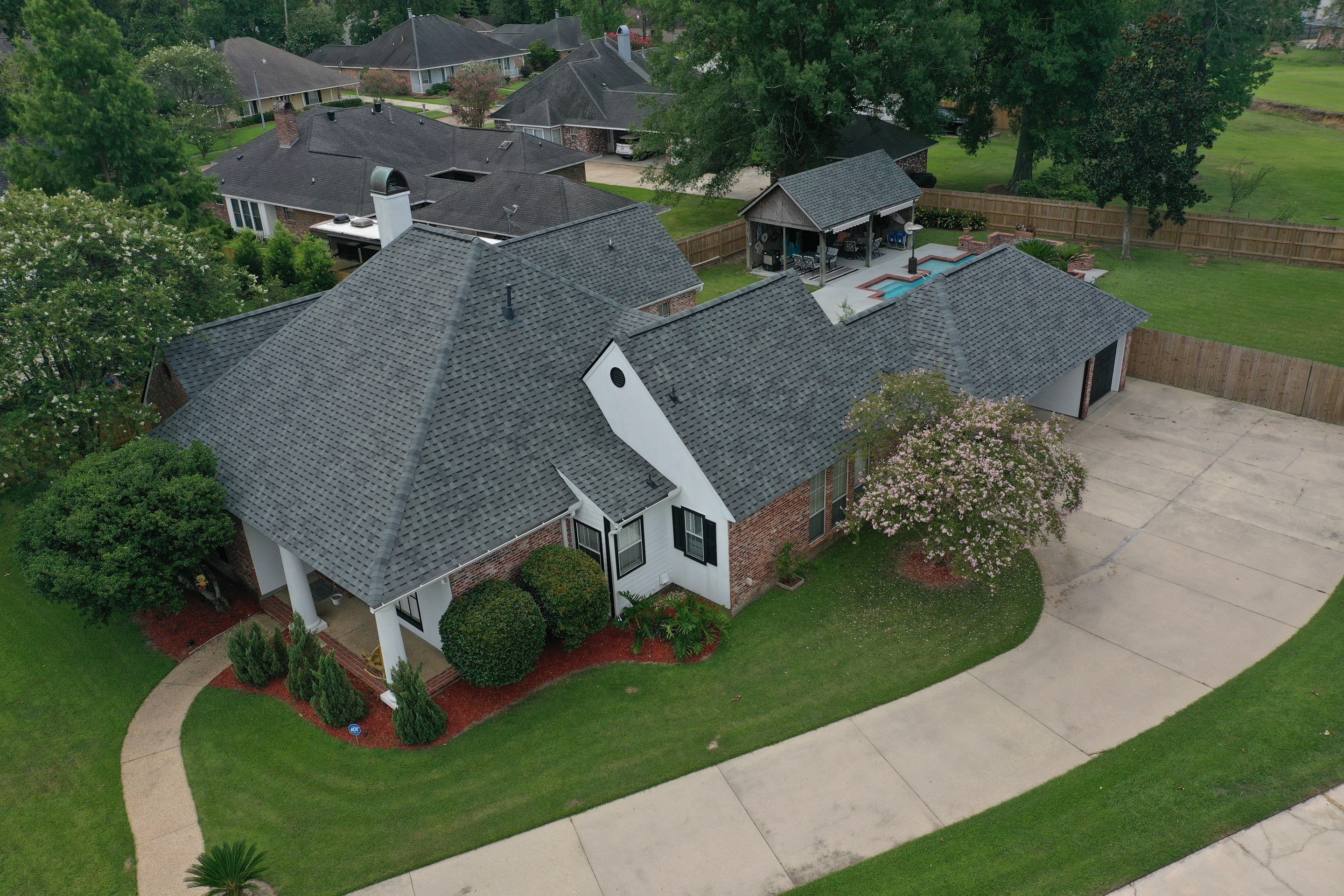 Residential Roofing Installation using Atlas Pinnacle Pristine Hearthstone by Top Team Construction