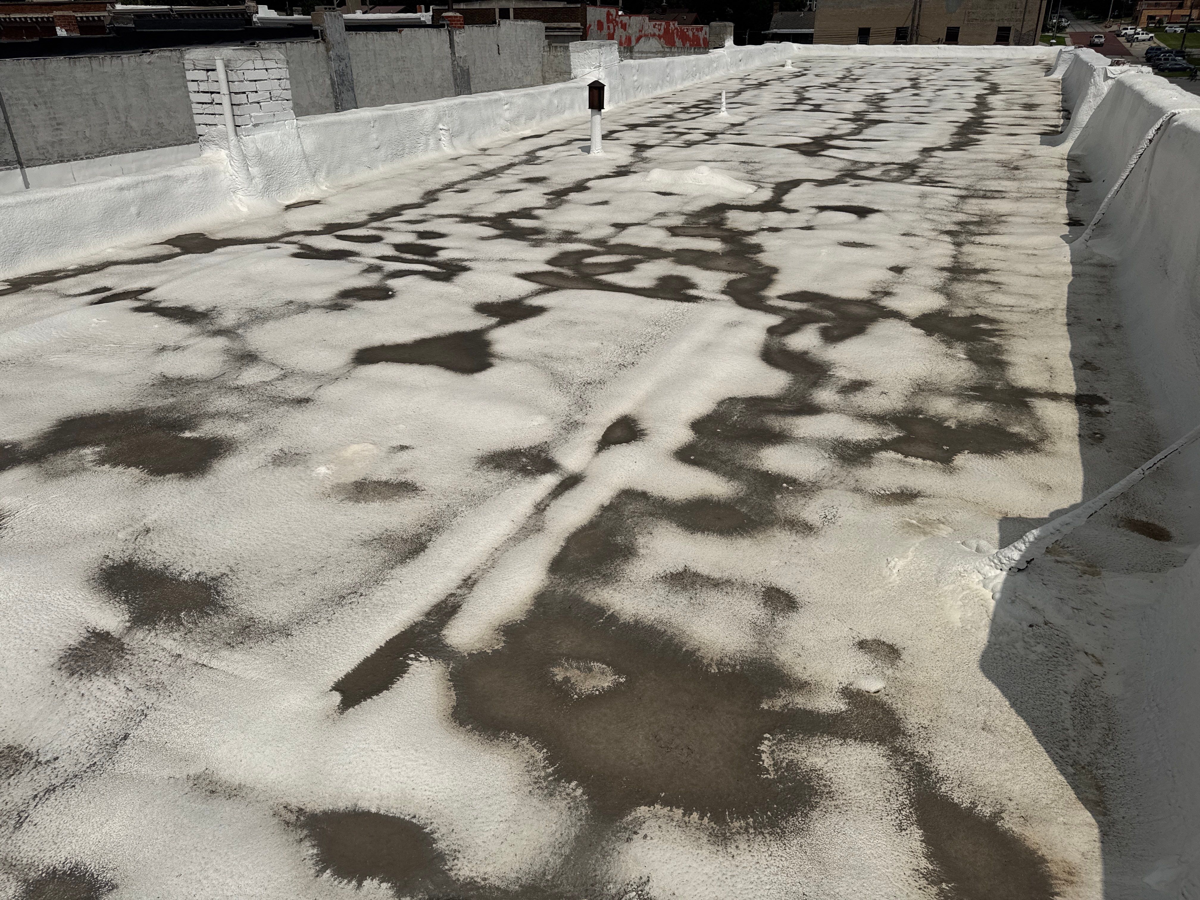 Commercial Flat Roof Elastomeric Coating and Repair in West Point by Crows Roofing LLC