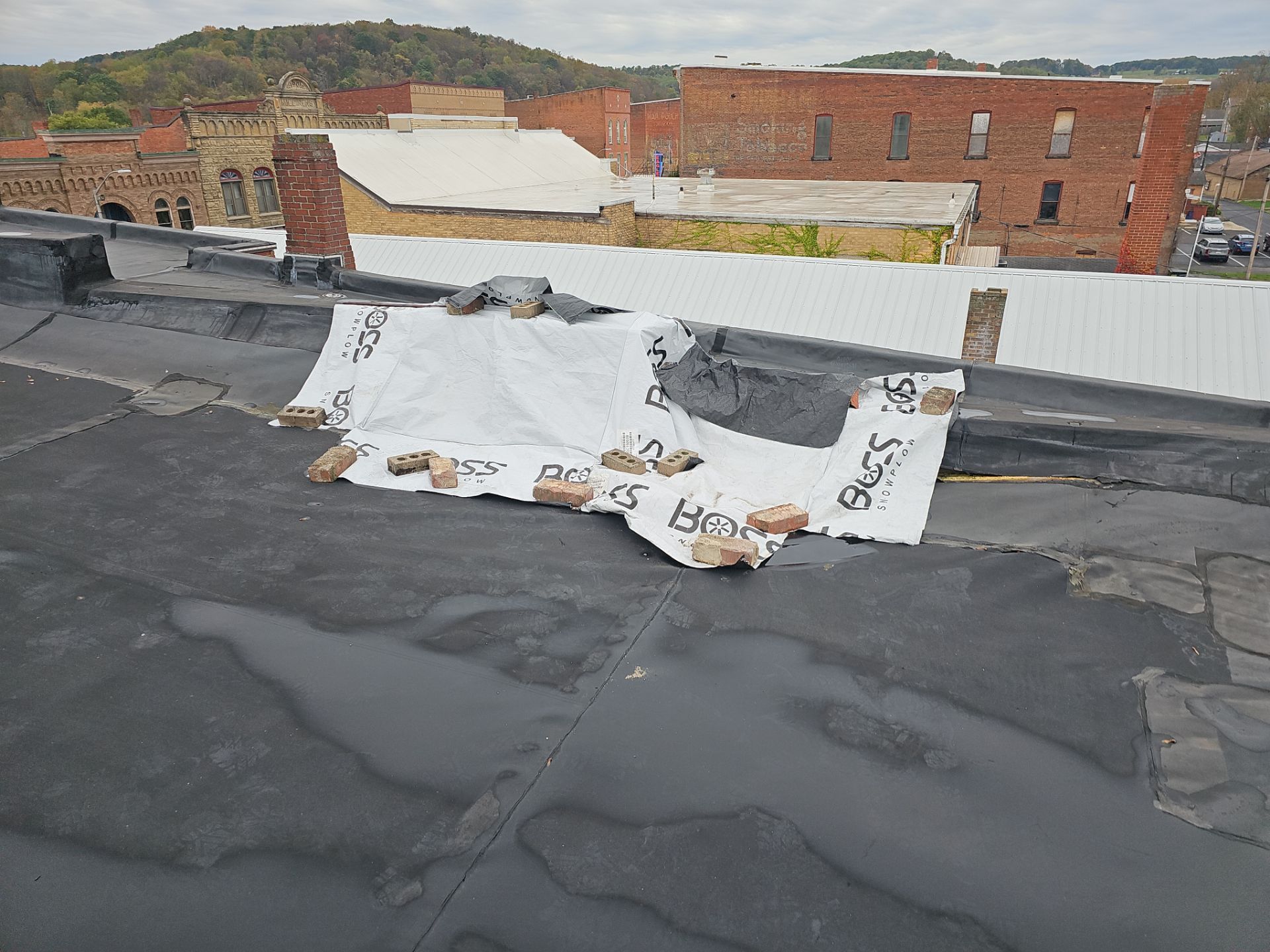 Western Auto  by 768 ROOF, LLC.