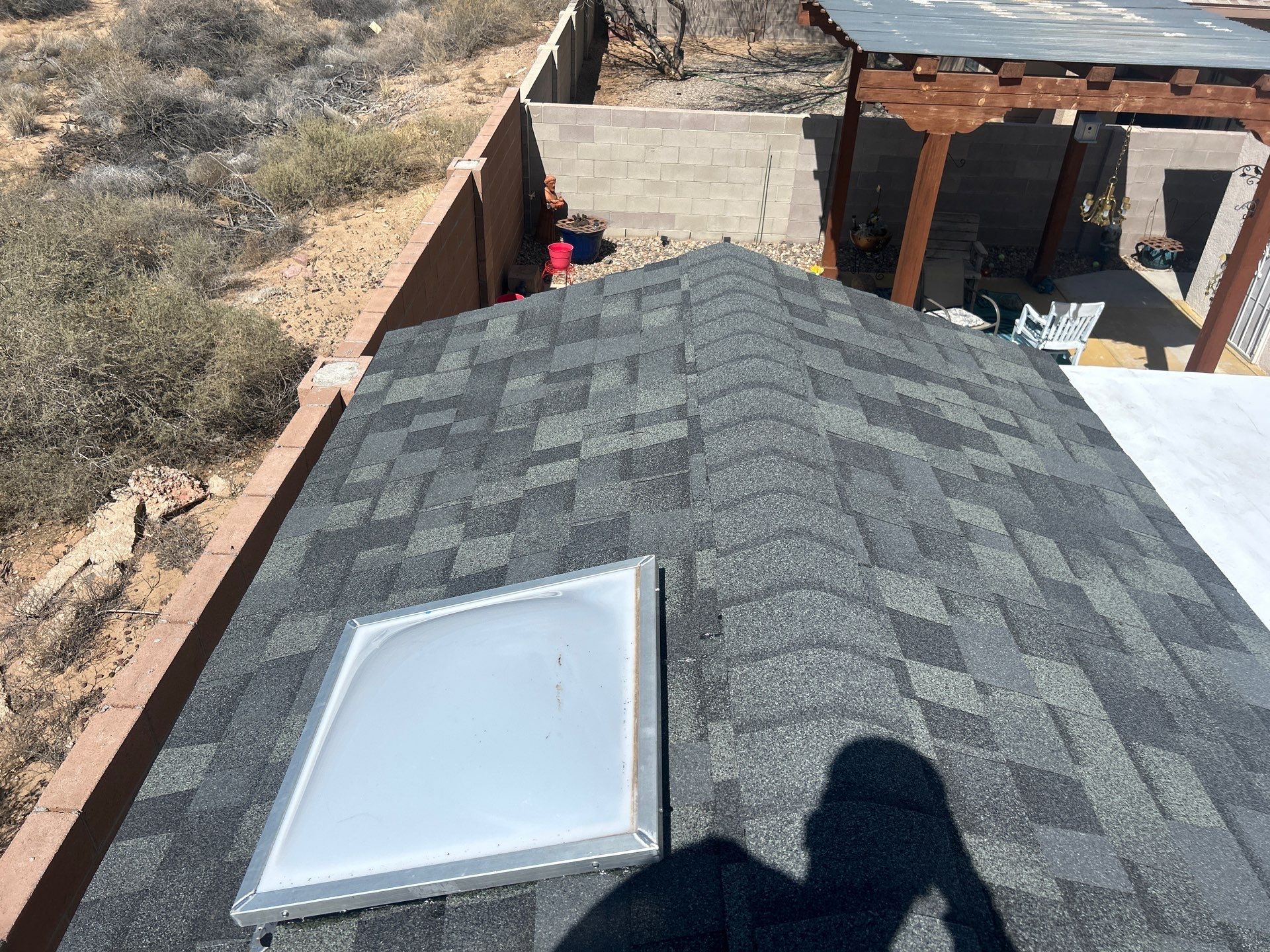 Santa Teresa St NW • Albuquerque, NM 87120 New shed roof, fascia and gutters by Doyle Roof Masters Inc