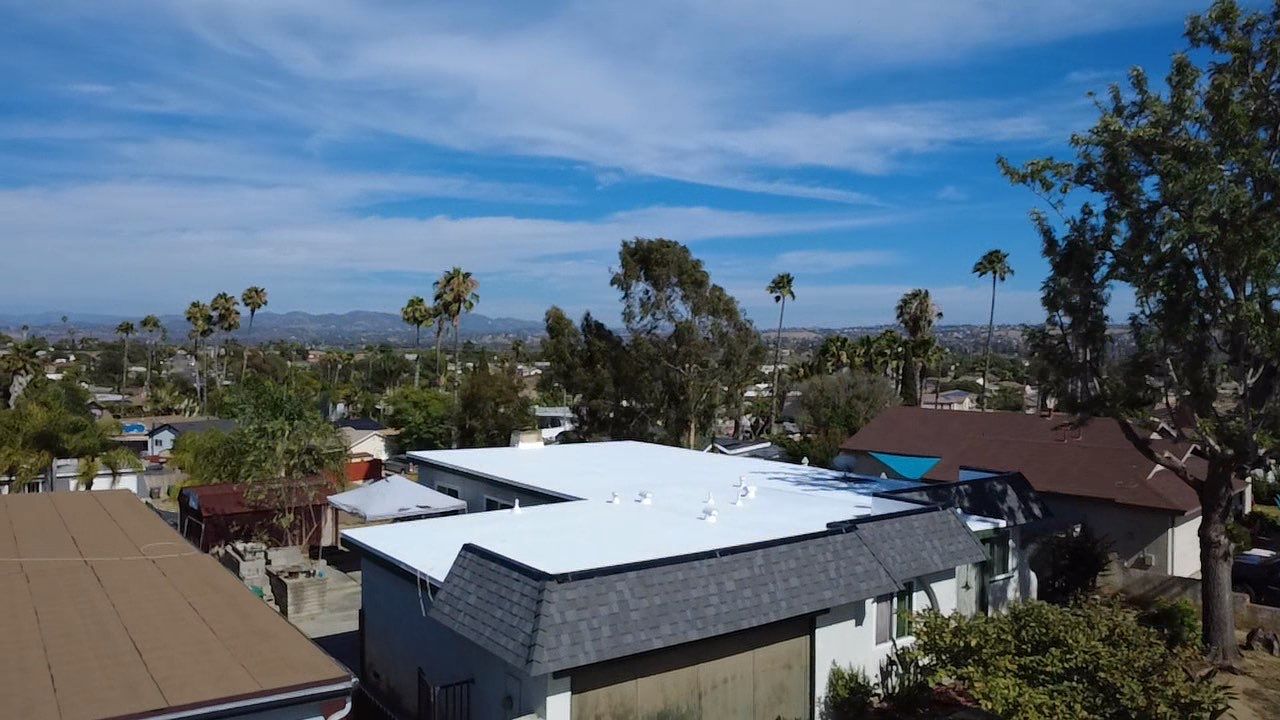 Oceanside Mansard TPO & Shingle Roof Replacement by Zenith Roofing Services