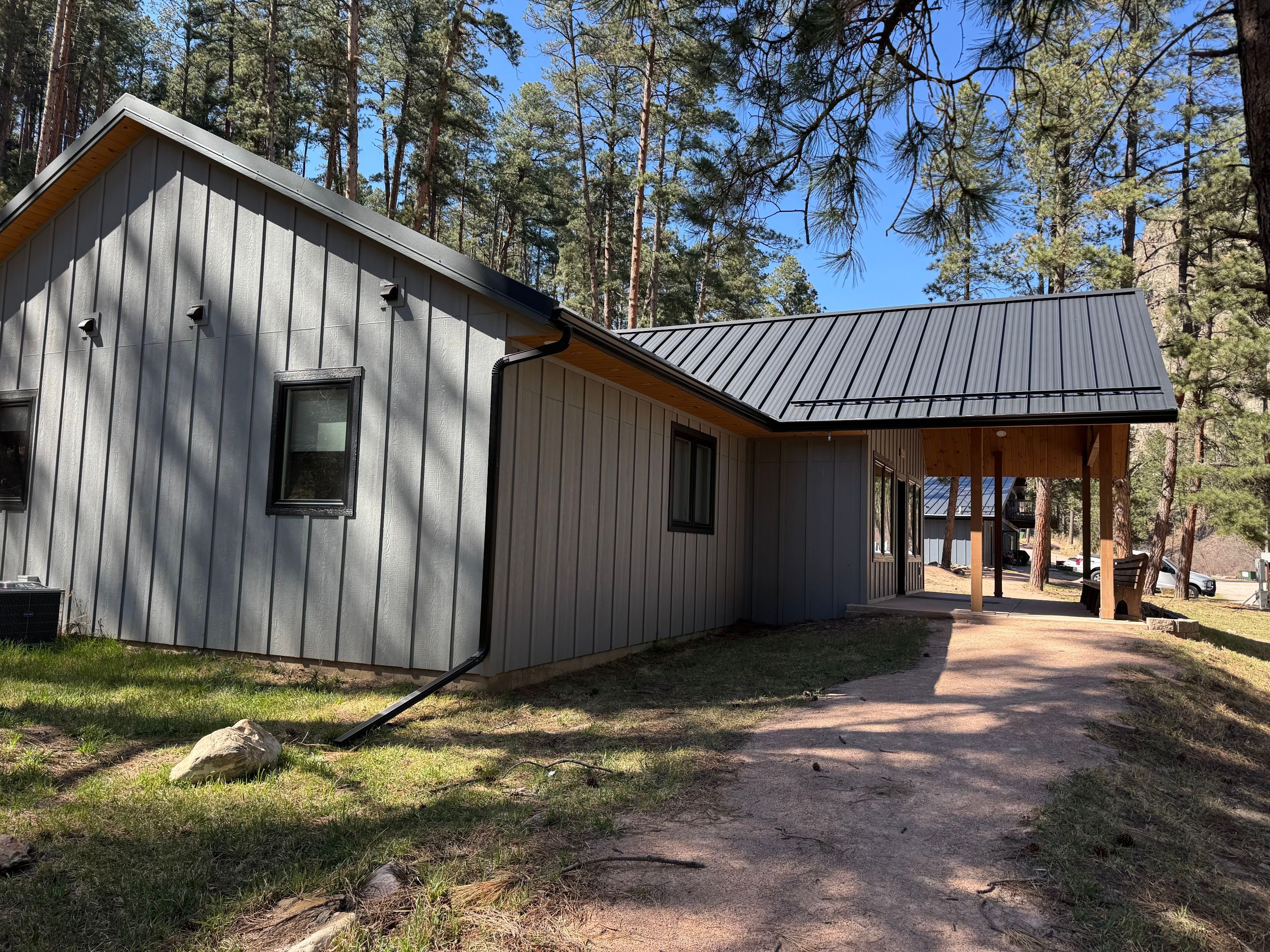 Residential Roofing Installation using Steel Roofing by Weather-Tite Exteriors LLC