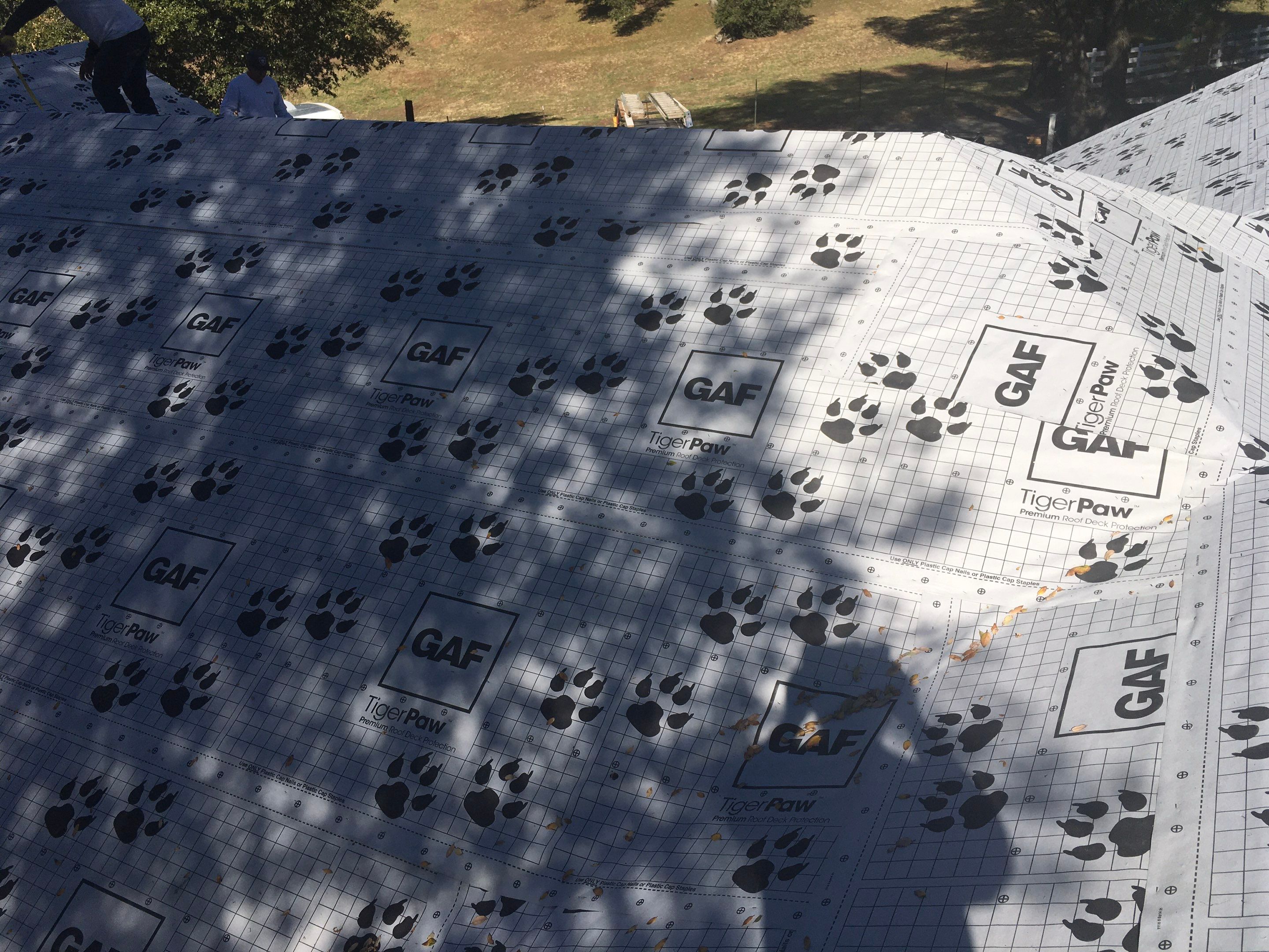 Metal roofing installation using Standing seam metal roofing system by Straight Edge Roofing Inc