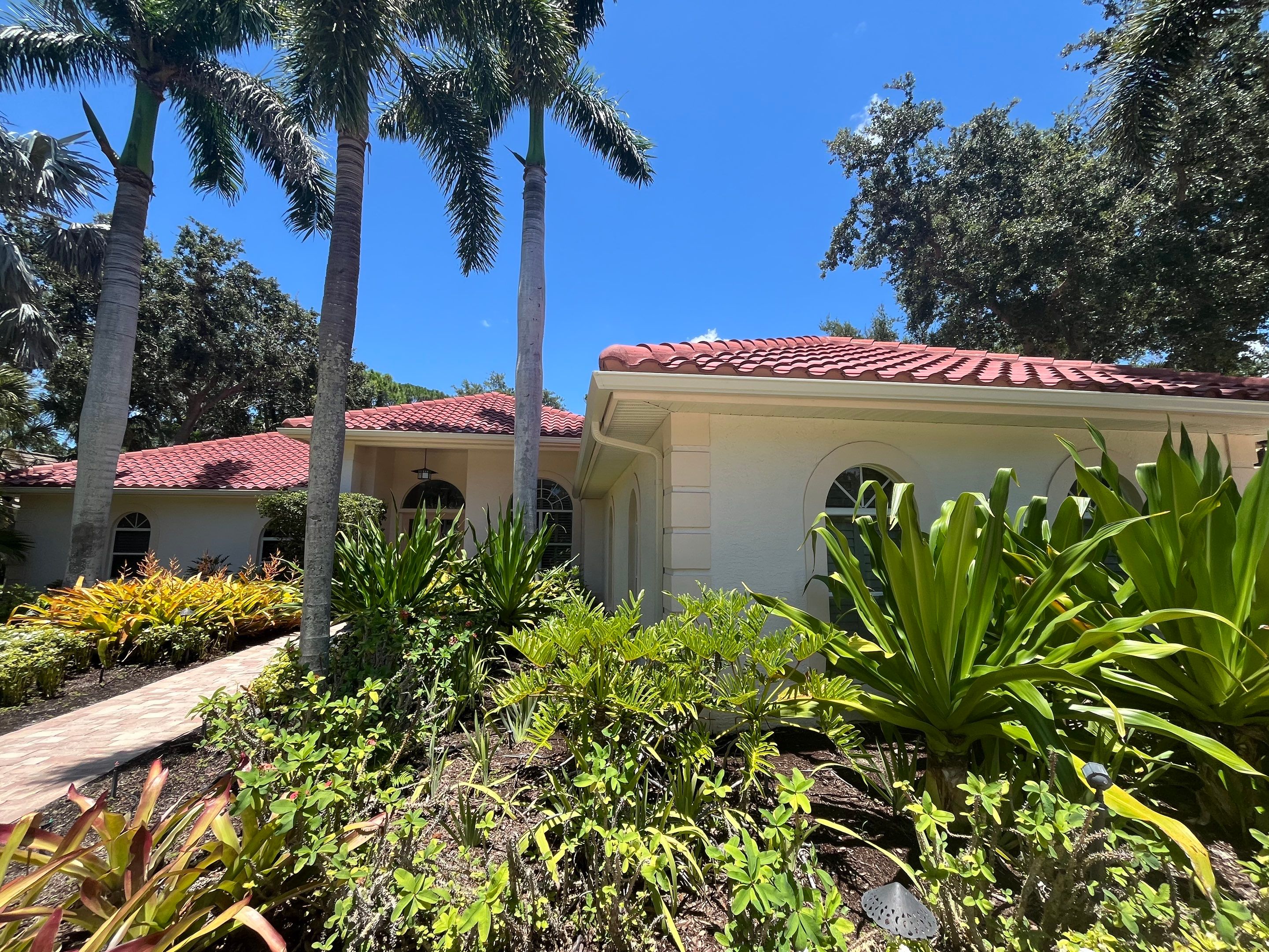 Splash Guard Gutters for Rainy Season Protection in Osprey FL by Gutter Professors