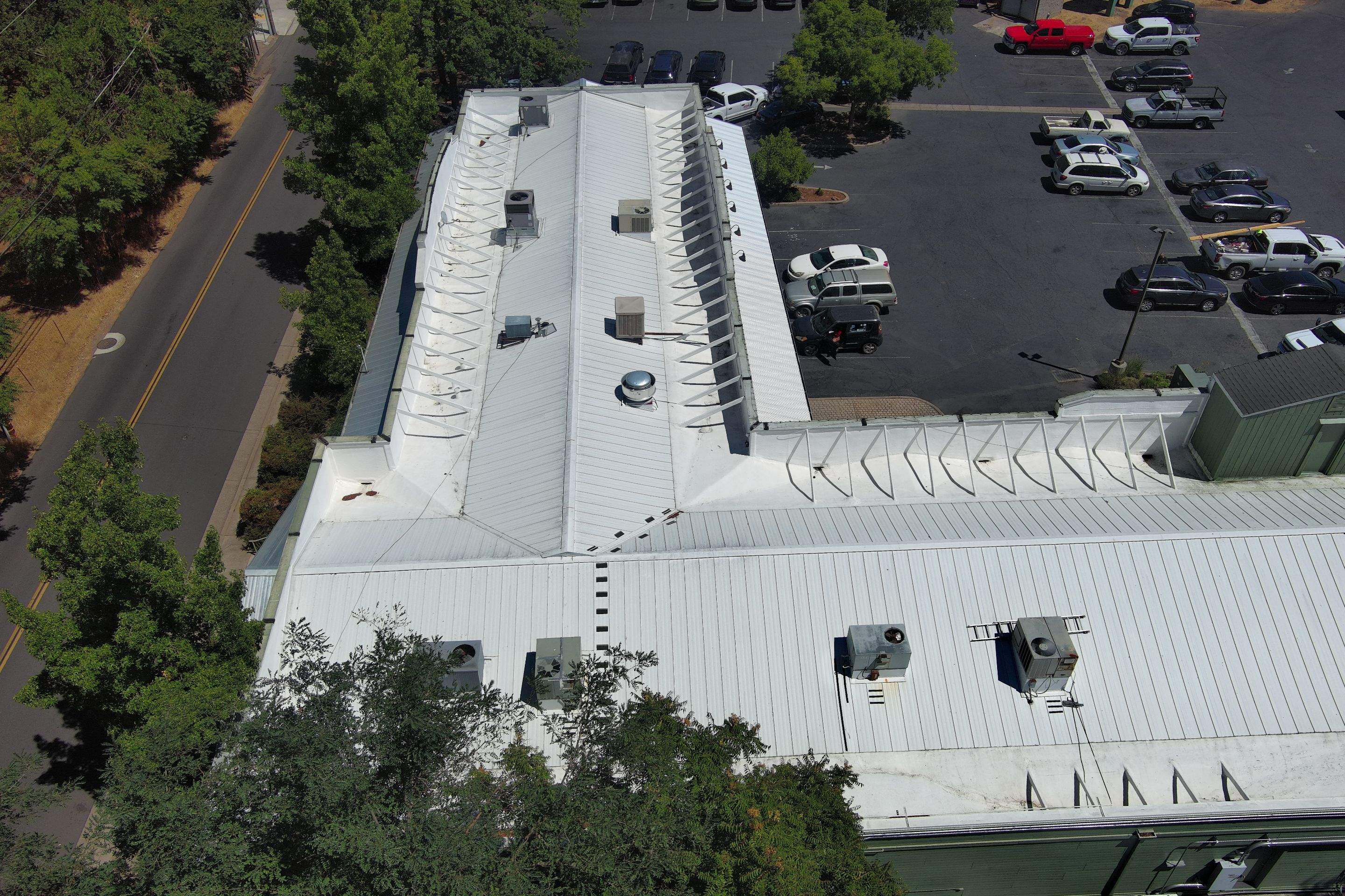 Foam Refurbish using Conklin Benchmark/PUMA XL coatings and spray foam by Straight Edge Roofing Inc