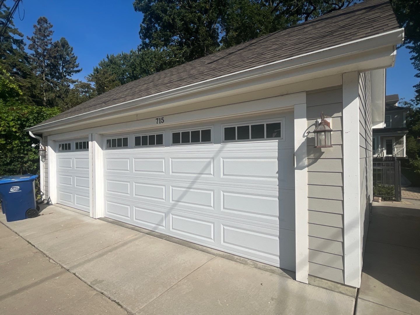 Hardie Board House & Detached Garage Soft Washing by Northern Power Washing LLC.