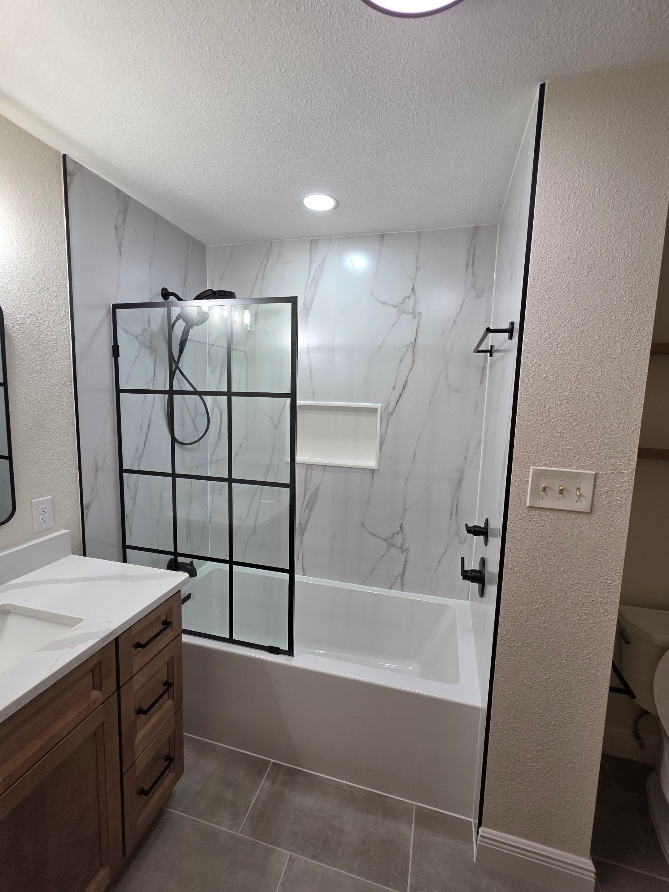 Guest Bathroom Remodel in Bulverde, TX | Tub Upgrade with Modern Finishes by Legacy Bath and Kitchen
