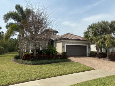 Concrete Tile Roof, Paver Pool Deck, Screen Enclosure & Driveway Cleaning in Artisan Lakes Esplanade, Palmetto, FL | Sunshine AquaWash