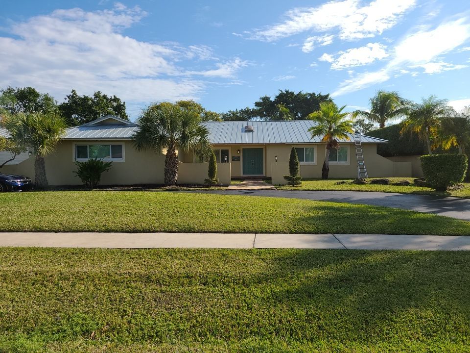 Residential Roofing Installation using 1" Nail strip metal roof by BLUES BROTHERS CONSTRUCTION CORP