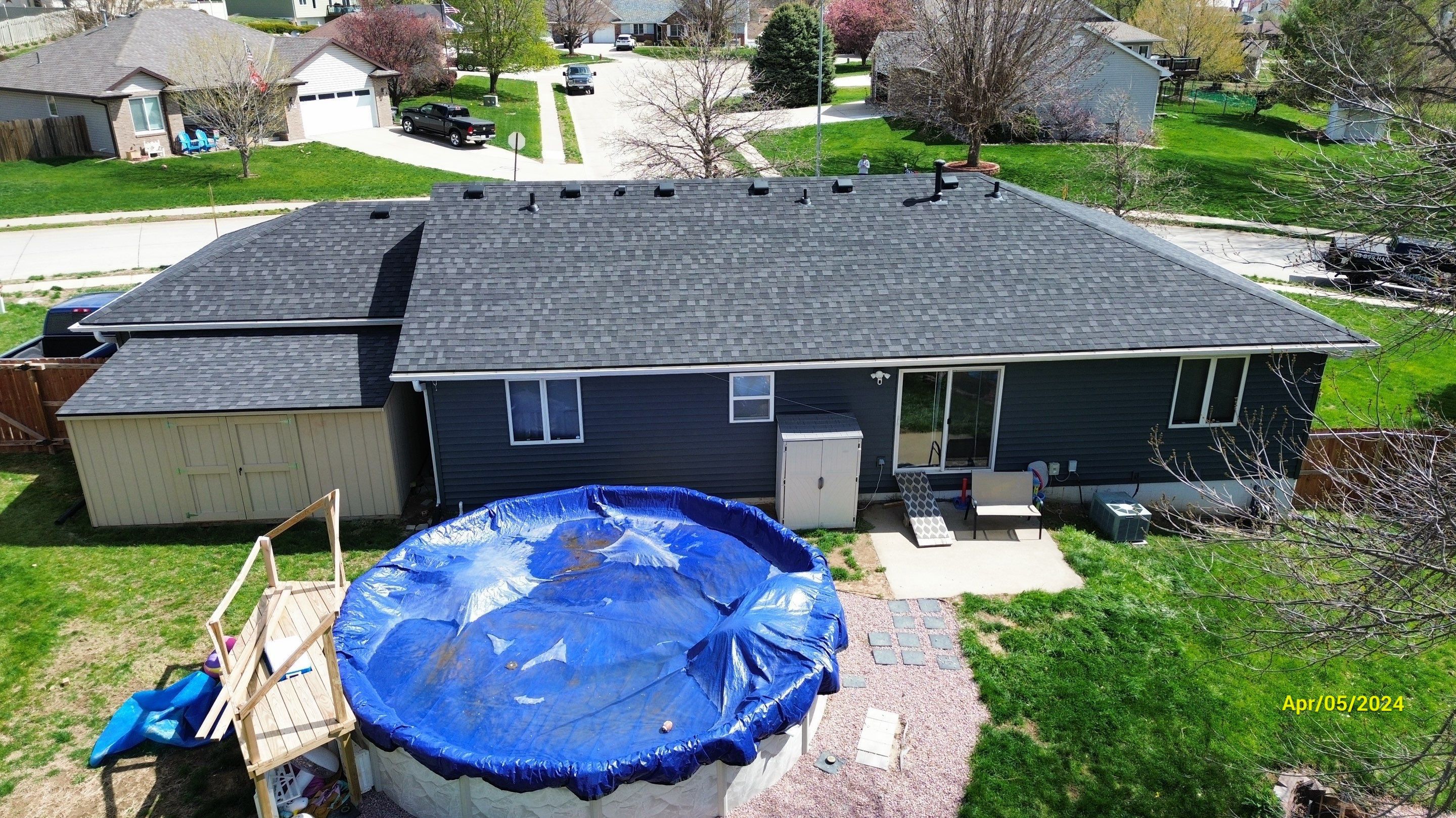 Roofing / Siding / Gutters using IKO Dynasty Granite Black / Norandex Siding by Lightning Exteriors